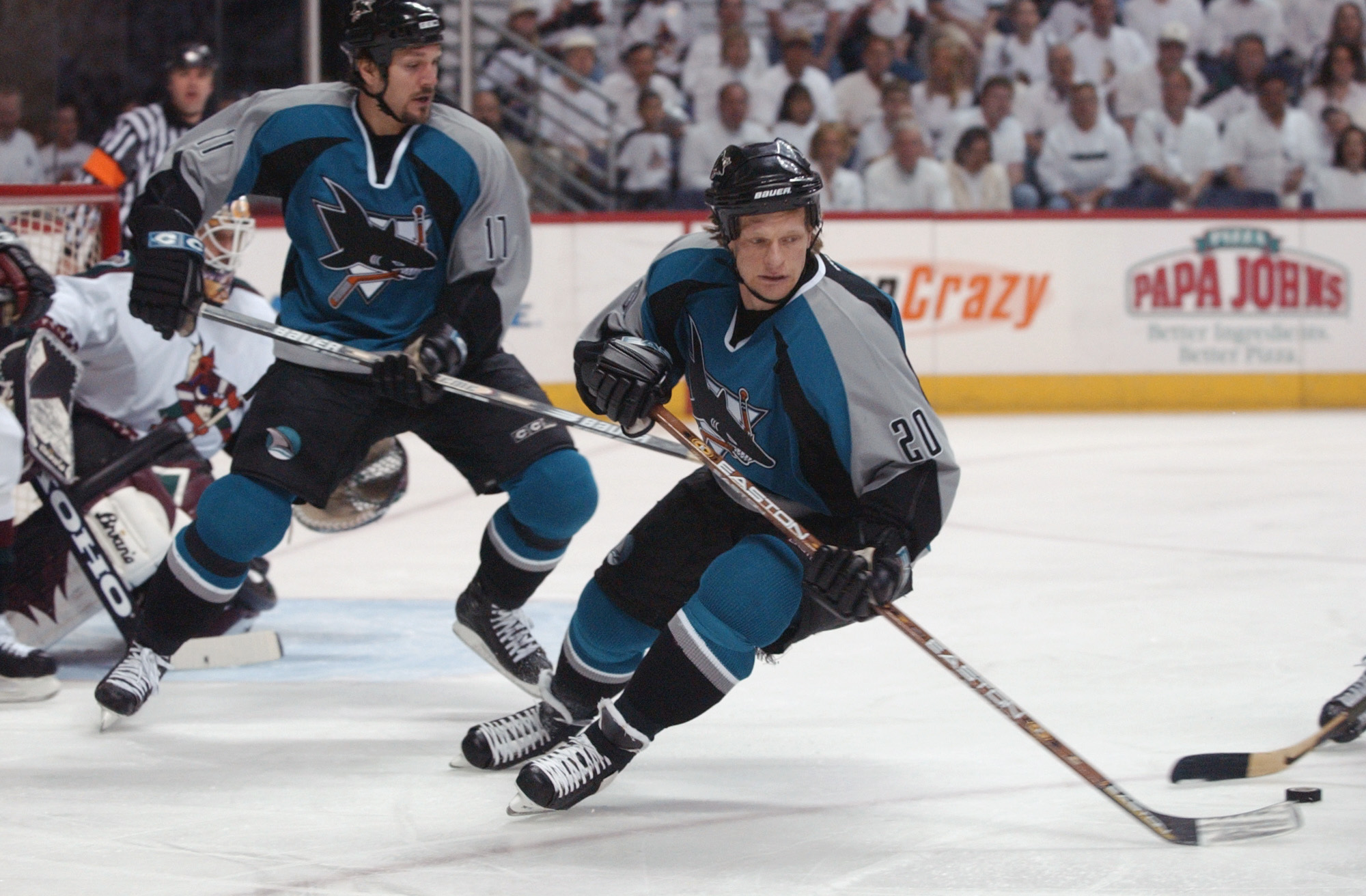 22 Apr 2002: Gary Suter #20 of the San Jose Sharks controls the puck against the Phoenix Coyotes during the game four of the Stanley Cup playoffs at America West Arena in Phoenix, Arizona. The Sharks won 4-1. DIGITAL IMAGE. Mandatory Credit: Harry How/Get