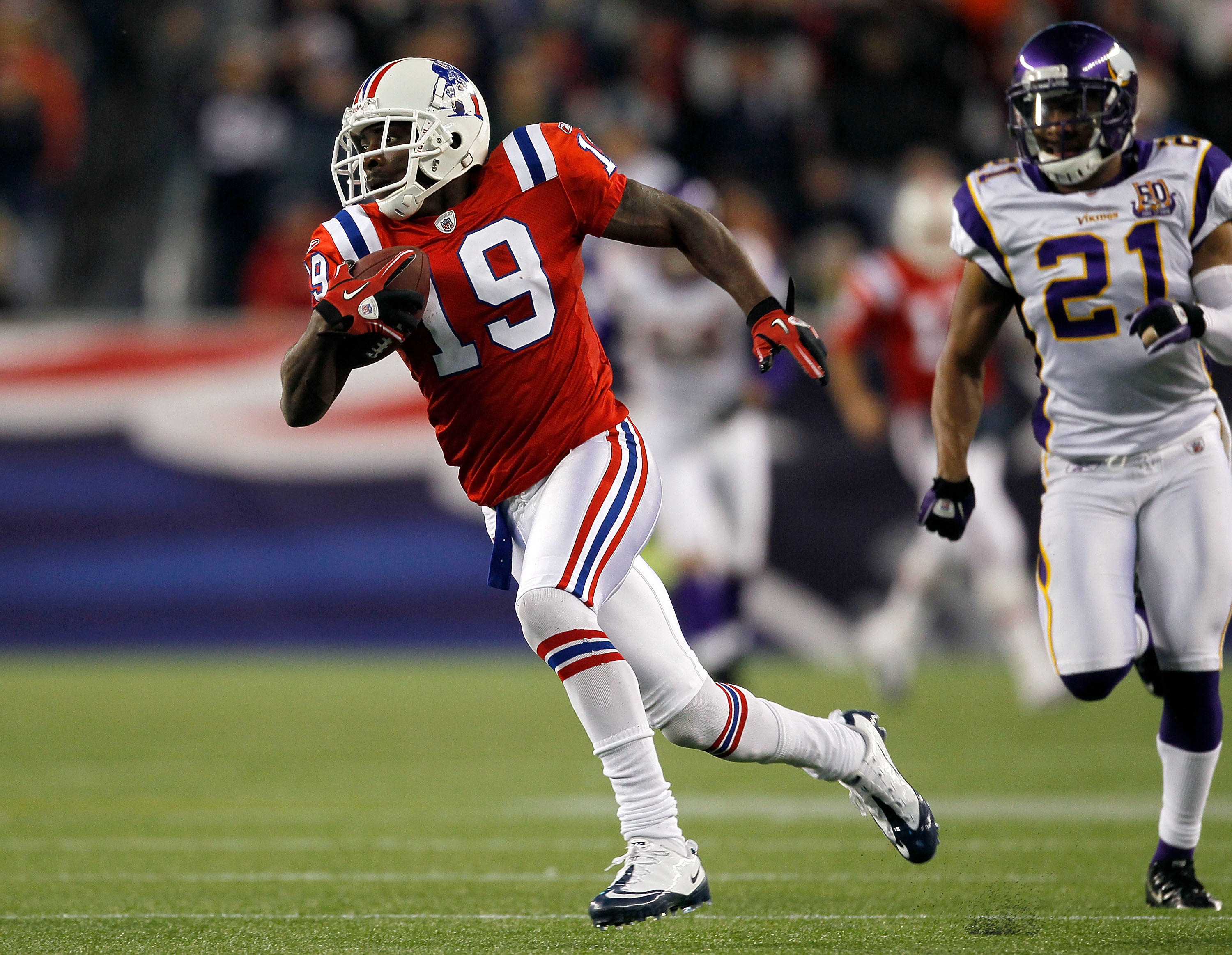 New England Patriots quarterback Tom Brady (12) gives a hug to running back  BenJarvus Green-Ellis after his13-yard touchdown carry in the third quarter  against the Minnesota Vikings at Gillette Stadium in Foxboro