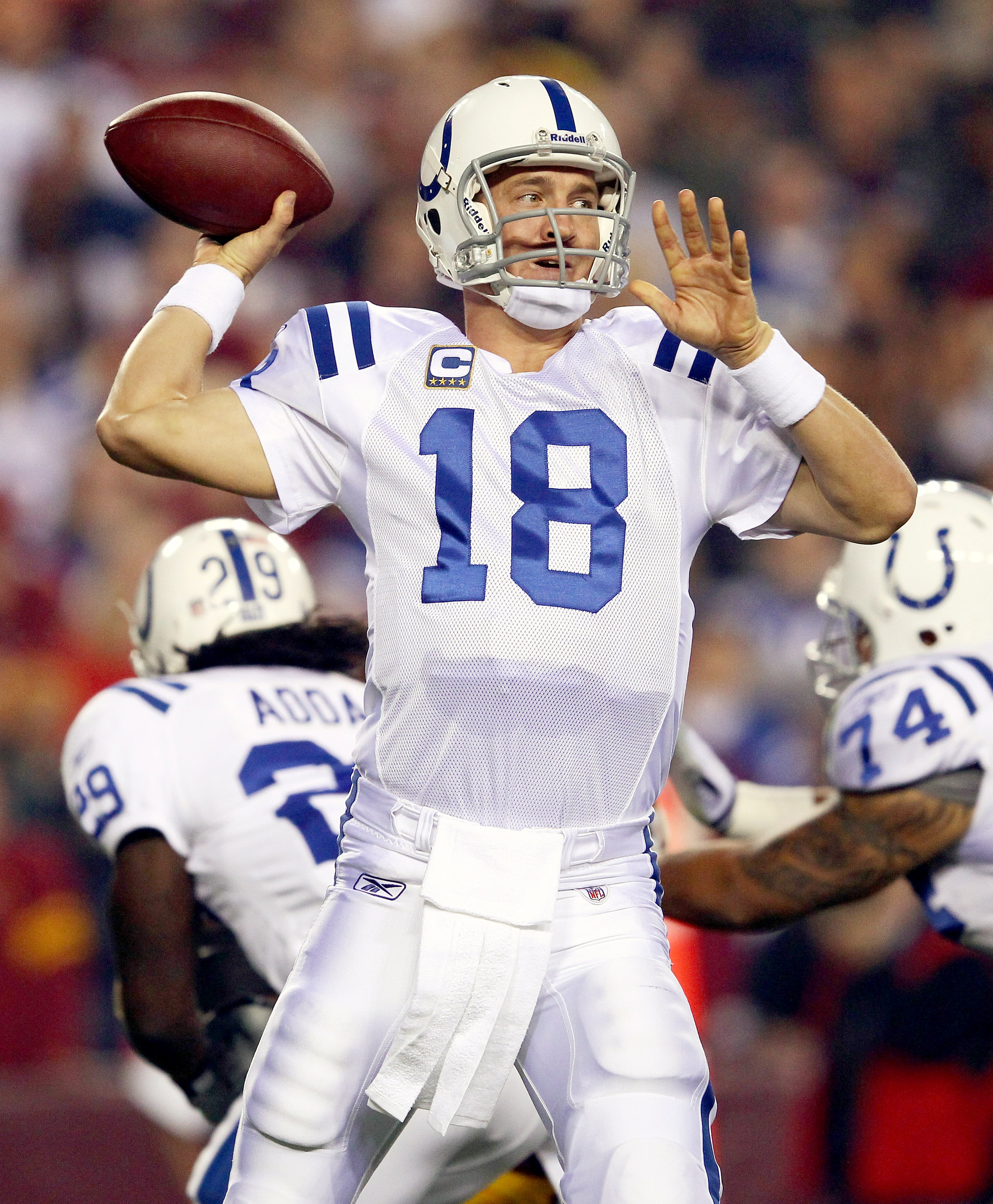 LANDOVER, MD - OCTOBER 17: Quarterback Peyton Manning #18 of the Indianapolis Colts throws a pass against the Washington Redskins at FedExField on October 17, 2010 in Landover, Maryland.  (Photo by Win McNamee/Getty Images)