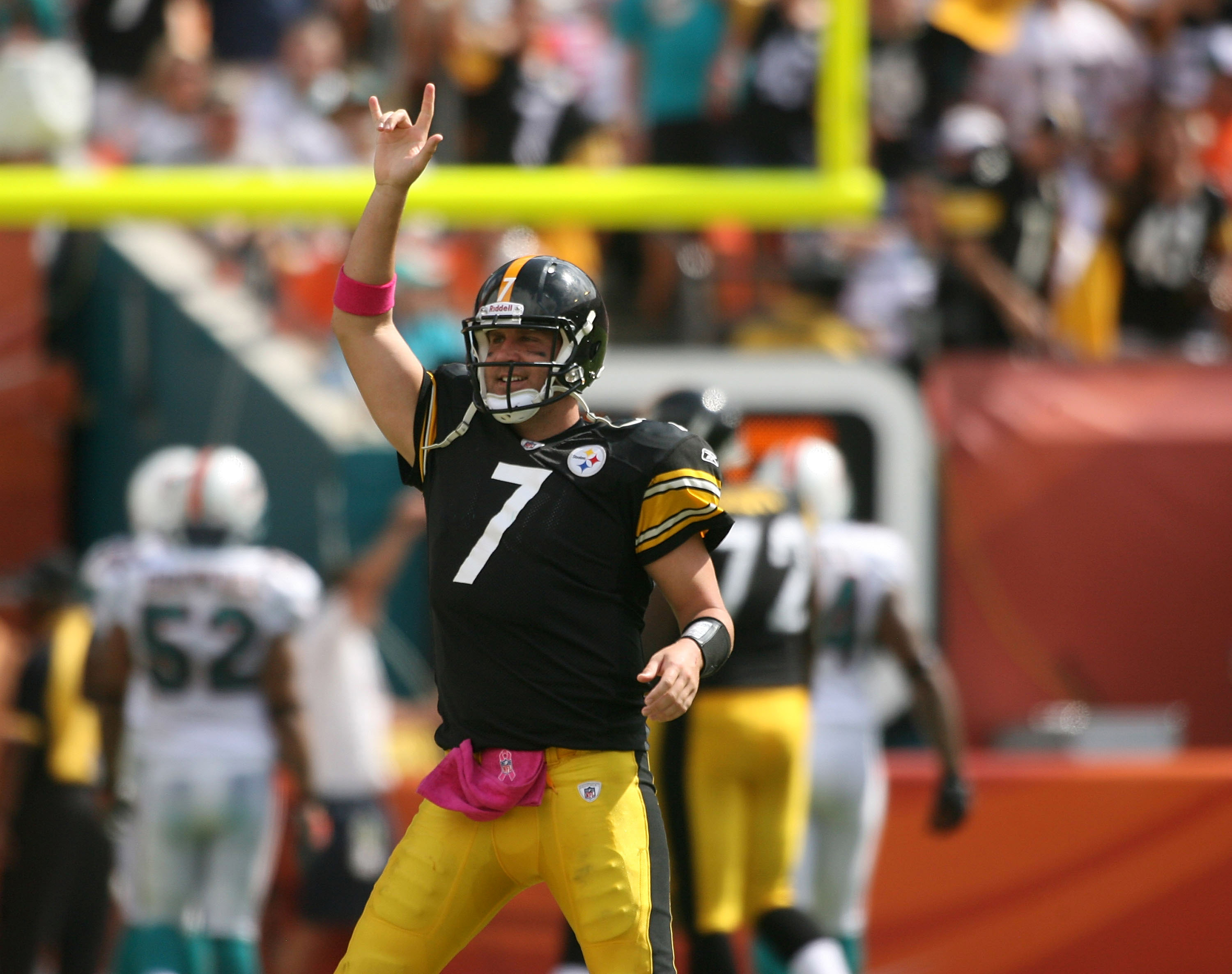 MIAMI - OCTOBER 24:  Quarterback Ben Roethlisberger #7 celebrates a touchdown against the Miami Dolphins at Sun Life Stadium on October 24, 2010 in Miami, Florida.  (Photo by Marc Serota/Getty Images)