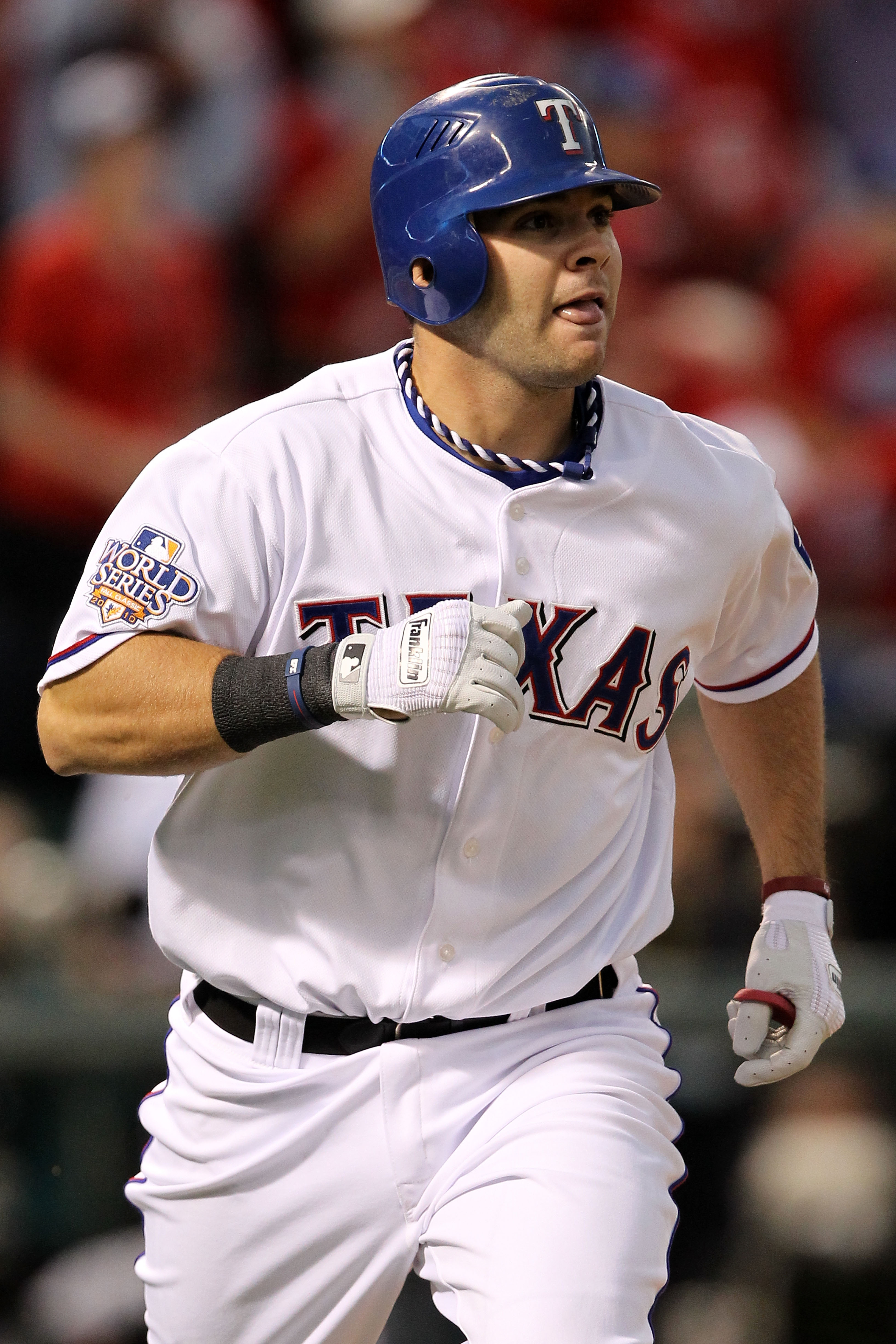 Texas Rangers' Josh Hamilton is congratulated by teammate Vladimir Guerrero  after hitting a solo homerun during the 5th inning against the San  Francisco Giants in game 3 of the World Series at