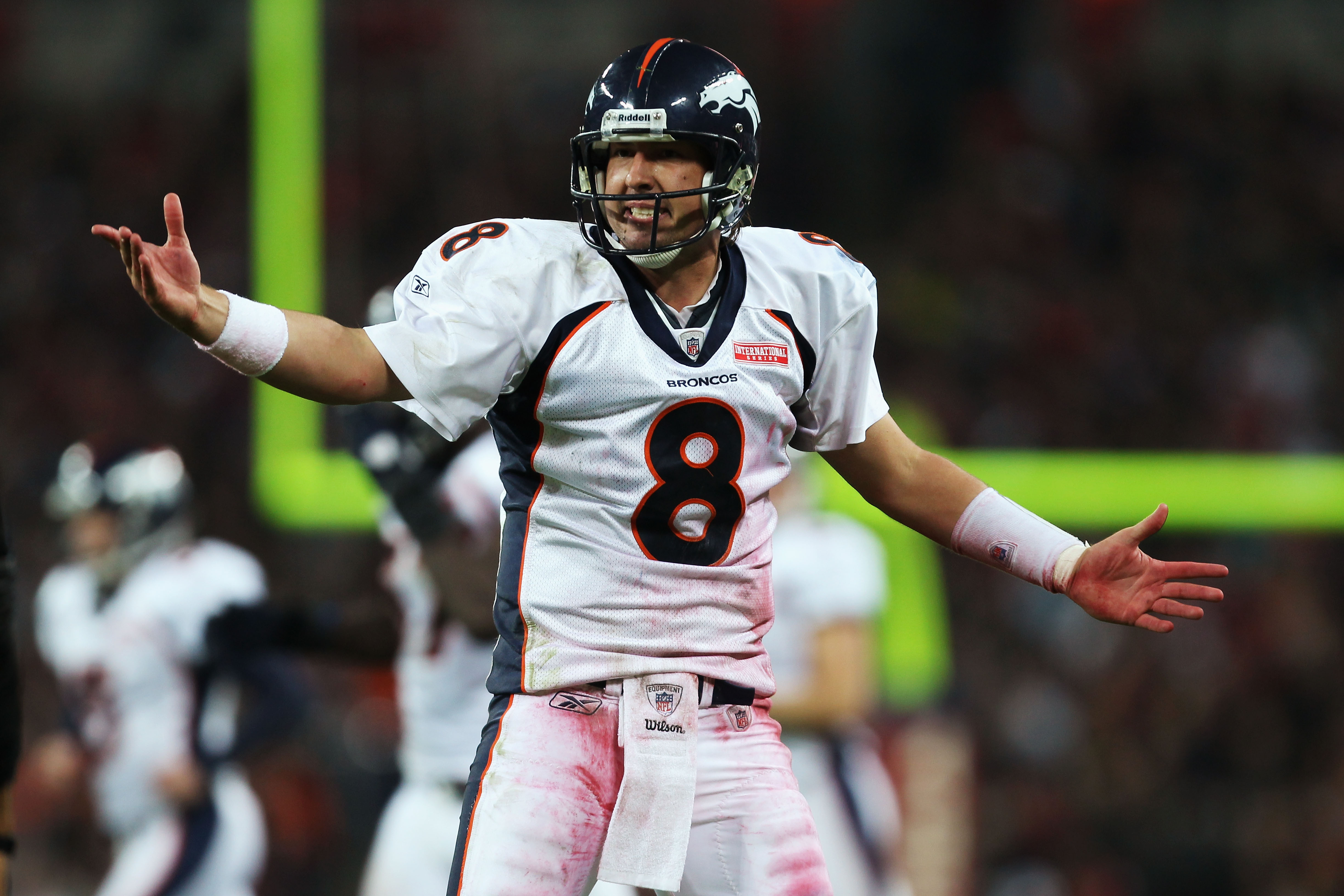 Denver Broncos Wide receiver Brandon Lloyd runs with the football during  their match with the San Francisco 49ers in the International NFL series  match at Wembley Stadium in London on October 31