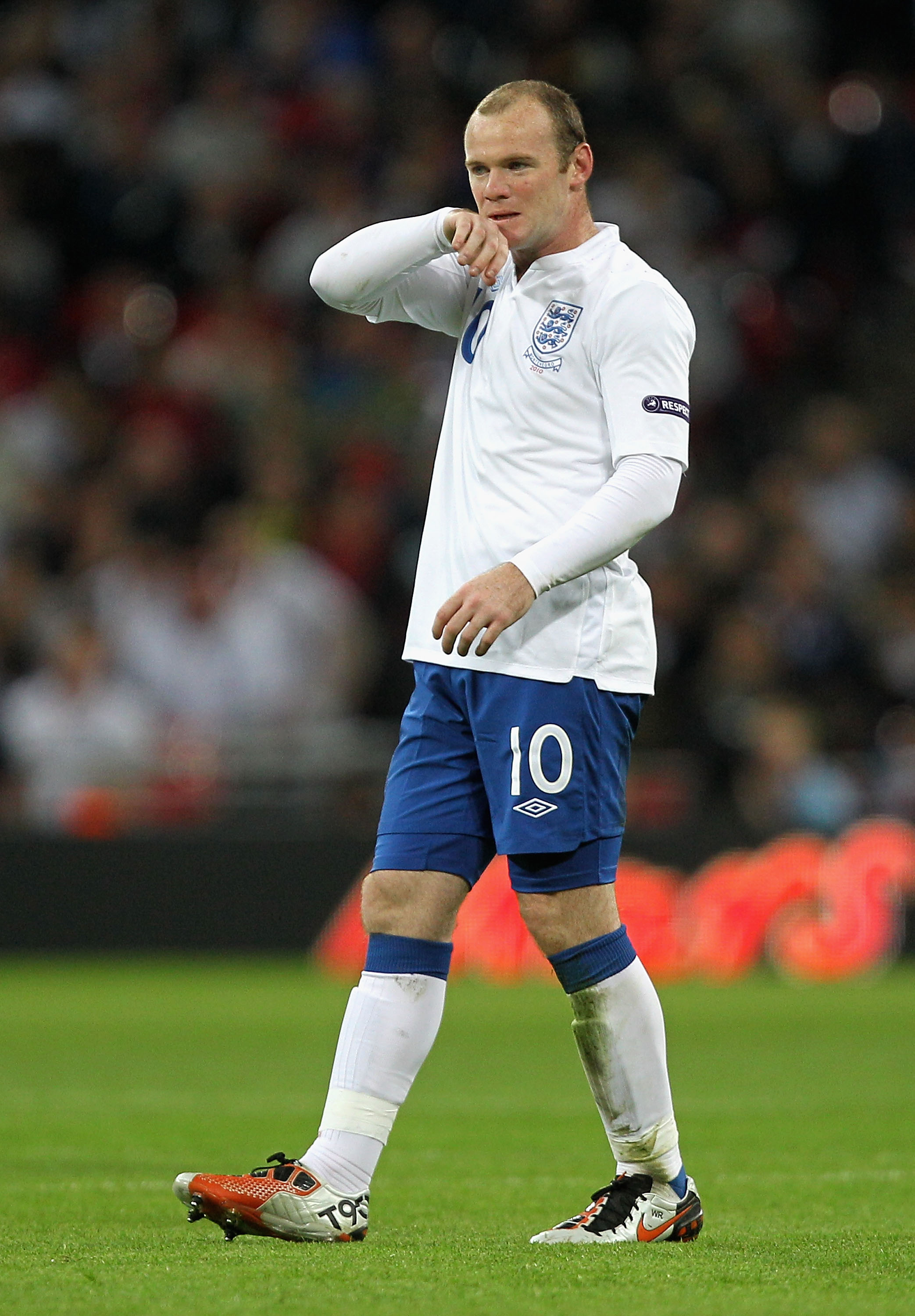 LONDON, ENGLAND - OCTOBER 12:  Wayne Rooney of England shows his frustration during the UEFA EURO 2012 Group G Qualifying match between England and Montenegro at Wembley Stadium on October 12, 2010 in London, England.  (Photo by Hamish Blair/Getty Images)