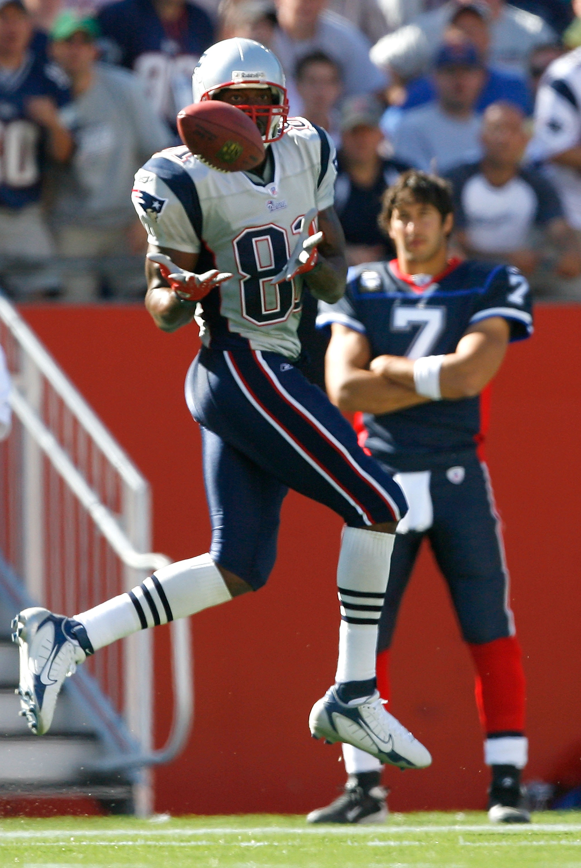 14 September 2009. Patriot Wide Receiver Randy Moss (81) runs following one  of twelve catches on the evening. This one in the second quarter. The New  England Patriots defeated the Buffalo Bills