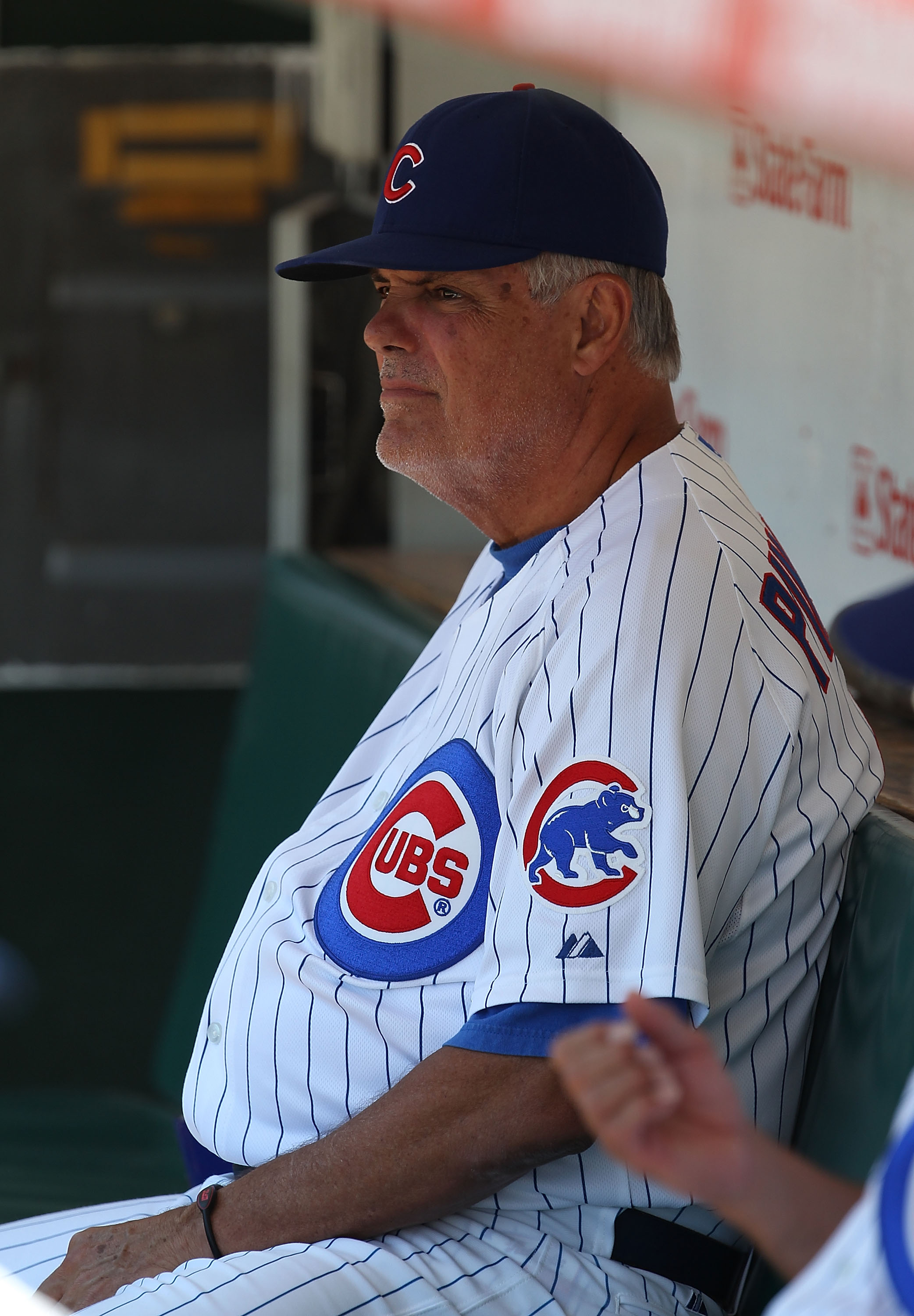 CHICAGO - JULY 21: Manager Lou Piniella #41 of the Chicago Cubs sits in the dugout before a game against the Houston Astros at Wrigley Field on July 21, 2010 in Chicago, Illinois. (Photo by Jonathan Daniel/Getty Images)