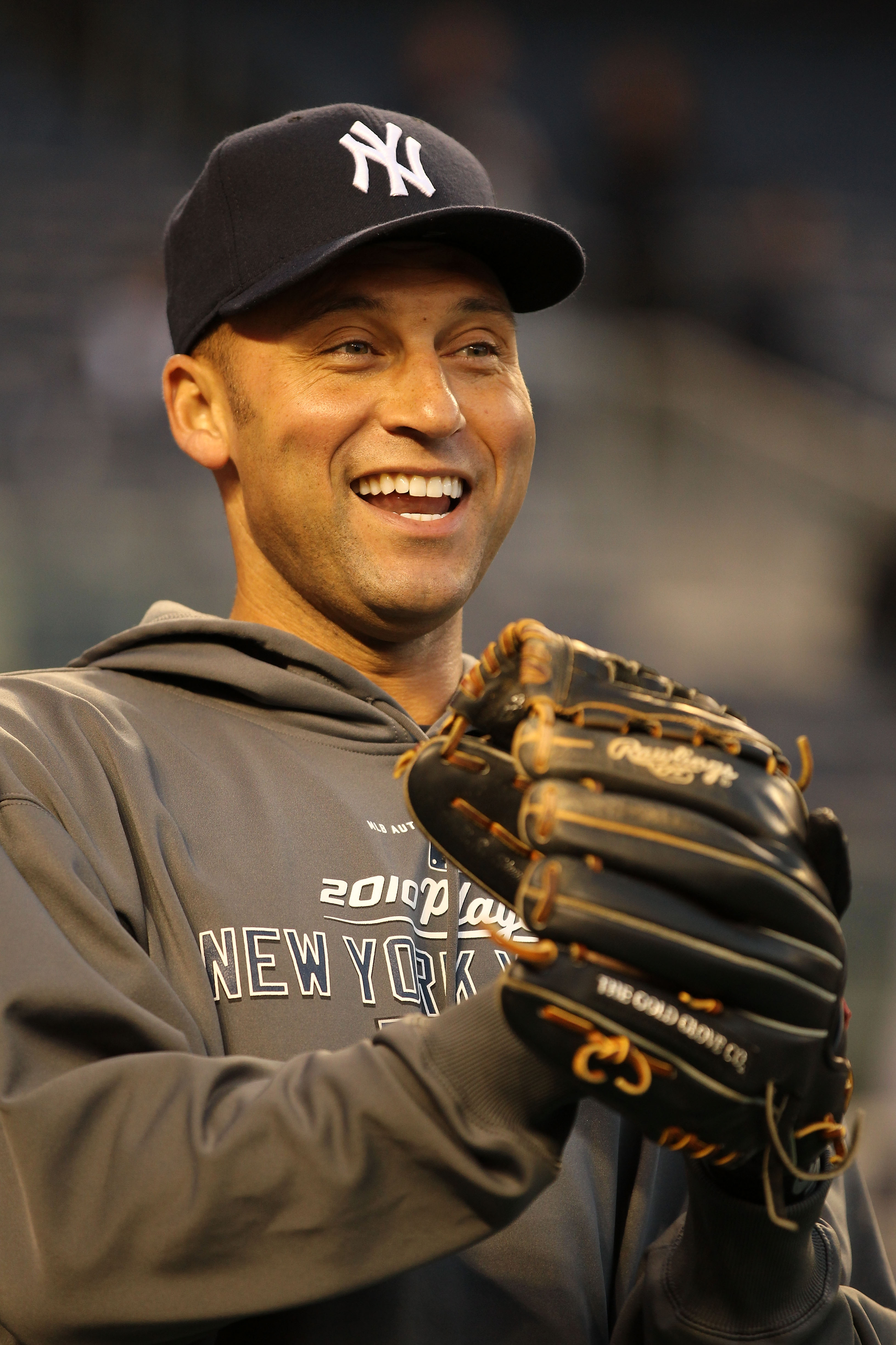 NEW YORK - OCTOBER 19:  Derek Jeter #2 of the New York Yankees smiles during batting practice against the Texas Rangers in Game Four of the ALCS during the 2010 MLB Playoffs at Yankee Stadium on October 19, 2010 in the Bronx borough of New York City.  (Ph