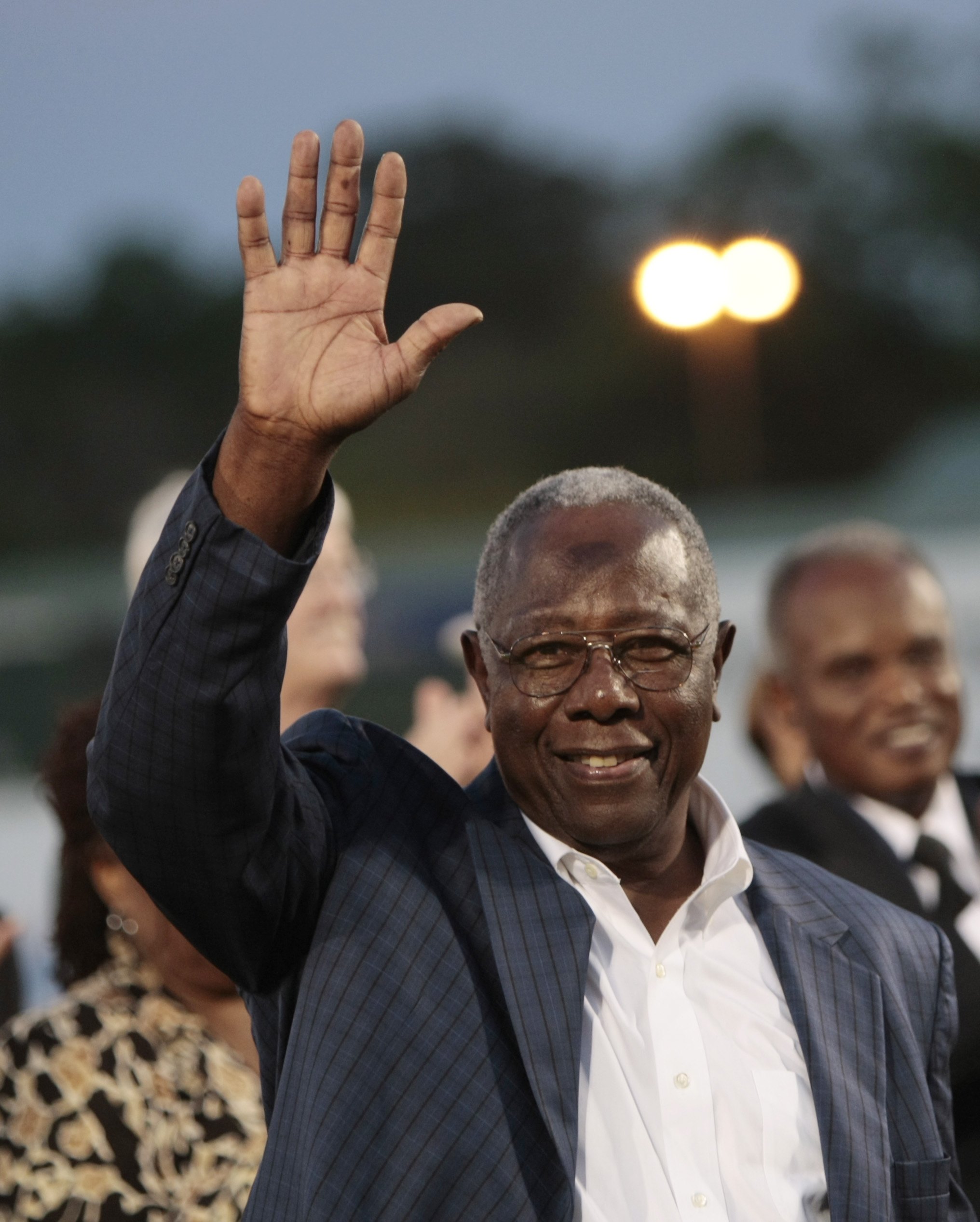 MOBILE, AL - APRIL 14: MLB Hall of Famer Hank Aaron waves to fans during pre-game ceremonies following the opening the Hank Aaron Museum at the Hank Aaron Stadium on April 14, 2010 in Mobile, Alabama. (Photo by Dave Martin/Getty Images)