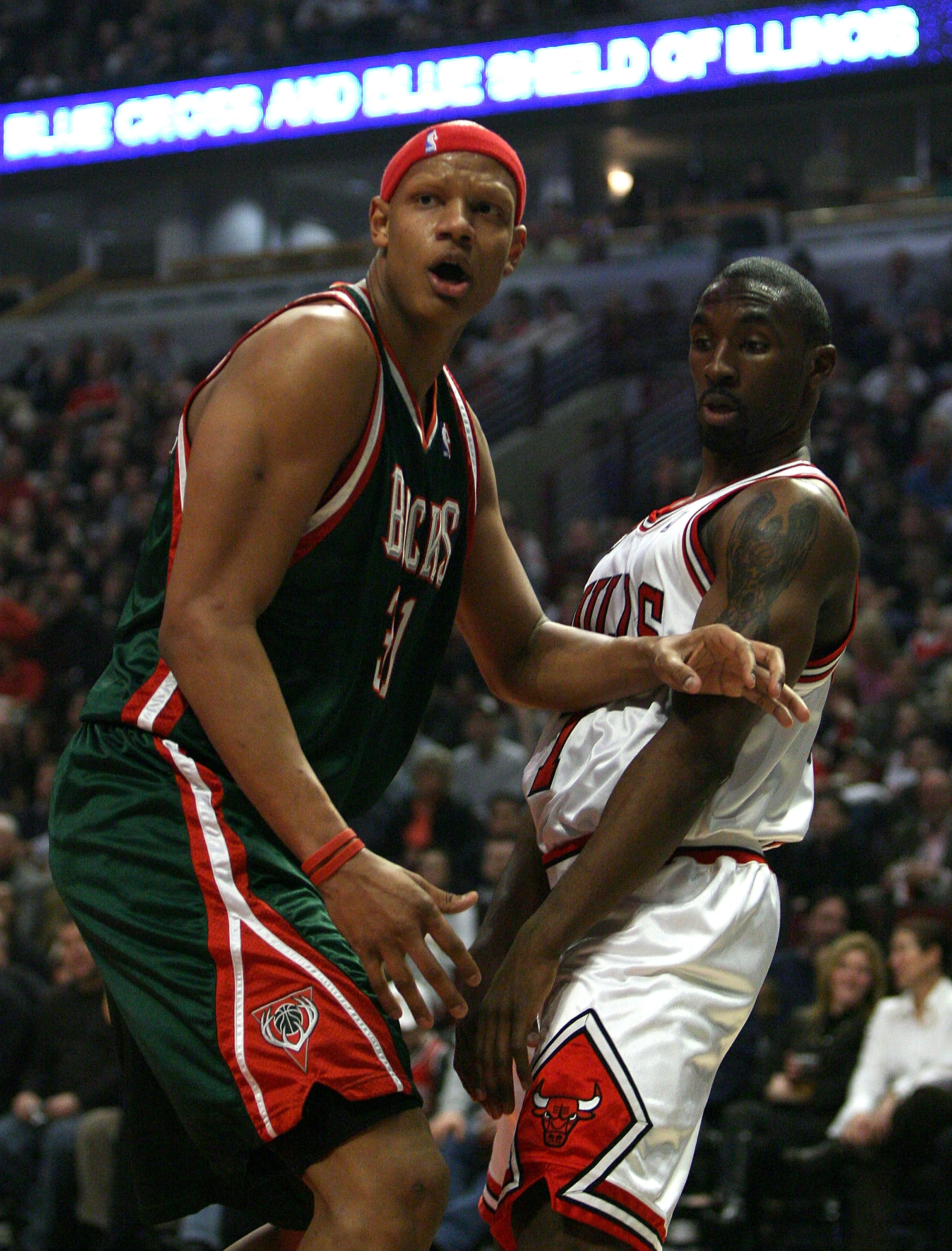 CHICAGO - MARCH 06:  Charlie Villanueva #31 of the Milwaukee Bucks reacts after he didn't get a call on an offensive play which he thought he was fouled on in the first quarter as Ben Gordon #7 of the Chicago Bulls looks on at the United Center on March 6