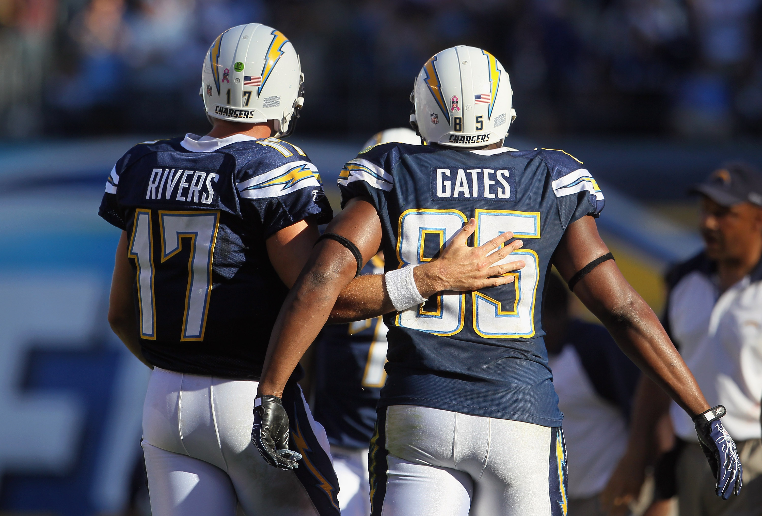 SAN DIEGO - OCTOBER 31:  Quarterback Philip Rivers #17 and tight end Antonio Gates #85 of the San Diego Chargers walk up the sideline together against the Tennessee Titans in the fourth quarter at Qualcomm Stadium on October 31, 2010 in San Diego, Califor