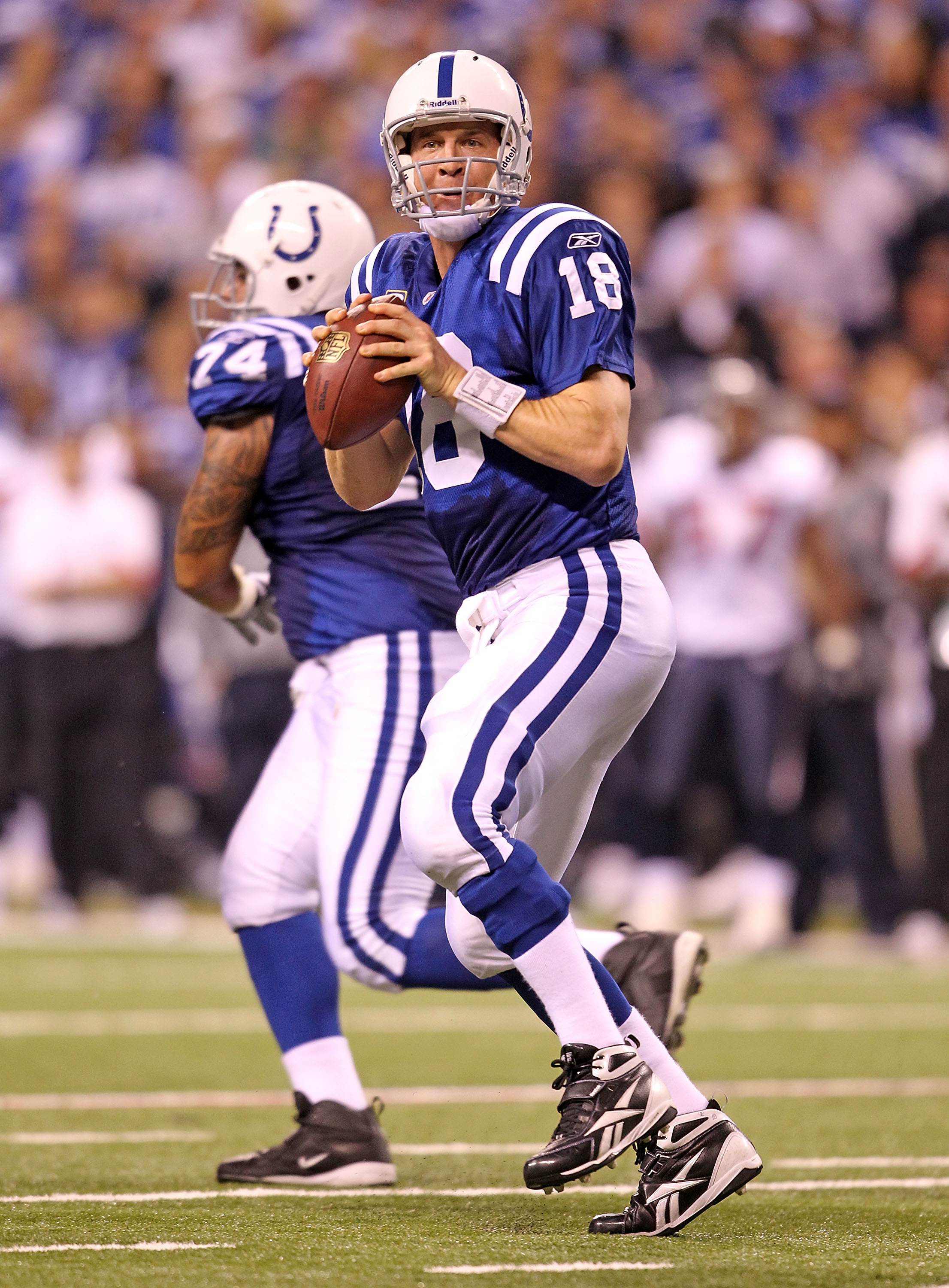 INDIANAPOLIS - NOVEMBER 01:  Peyton Manning #18 of Indianapolis Colts throws a pass during the NFL game against the Houston Texans  at Lucas Oil Stadium on November 1, 2010 in Indianapolis, Indiana.  (Photo by Andy Lyons/Getty Images)