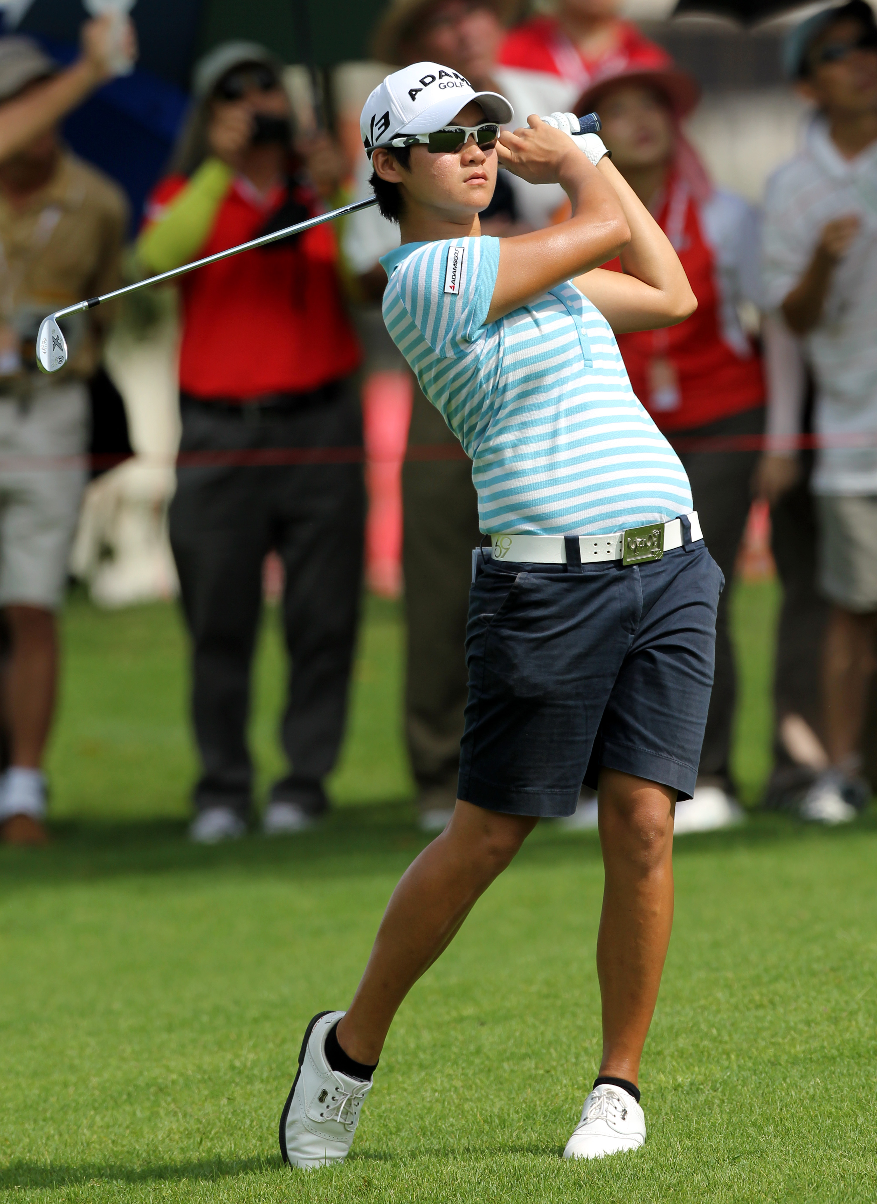 KUALA LUMPUR, MALAYSIA - OCTOBER 22: Yani Tseng of Taiwan watches her shot on the 3rd hole during Round One of the Sime Darby LPGA on October 22, 2010 at the Kuala Lumpur Golf and Country Club in Kuala Lumpur, Malaysia. (Photo by Stanley Chou/Getty Images