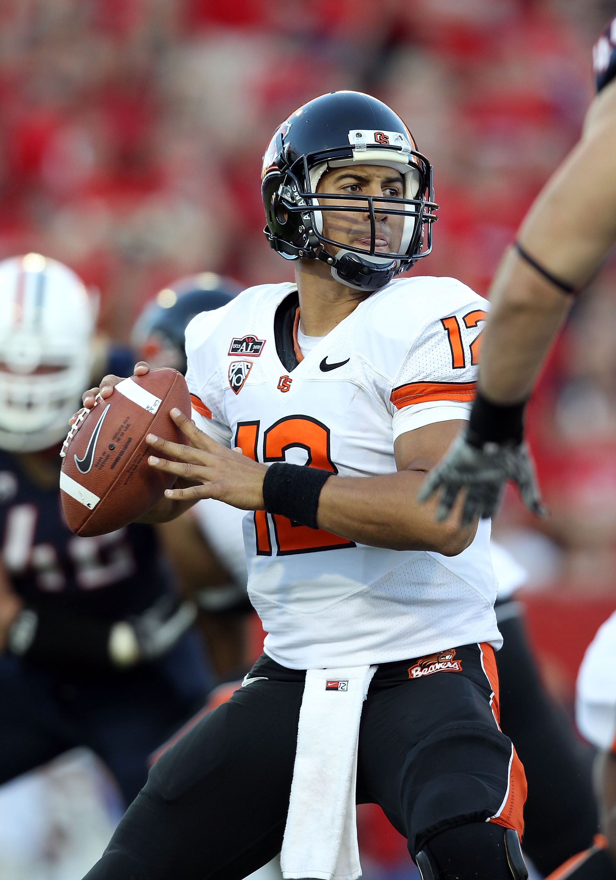 TUCSON, AZ - OCTOBER 09: Quarterback Ryan Katz #12 of the Oregon State Beavers drops back to pass during the college football game against the Arizona Wildcats at Arizona Stadium on October 9, 2010 in Tucson, Arizona. The Beavers defeated the Wildcats 2