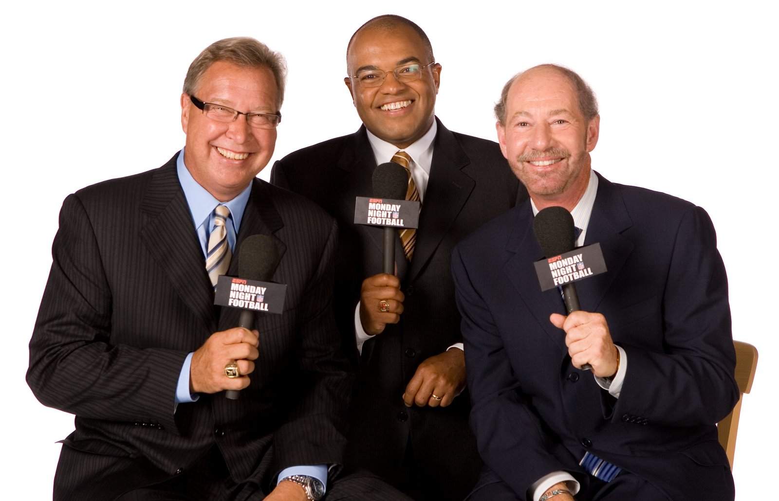 ** ADVANCE FOR WEEKEND EDITIONS, SEPT. 8-9 -- FILE -- ** ESPN Monday Night  Football commentator team Mike Tirico, right, Tony Kornheiser, center, and  Ron Jaworski, left, smile in their booth before the San Francisco 49ers and  Denver Broncos