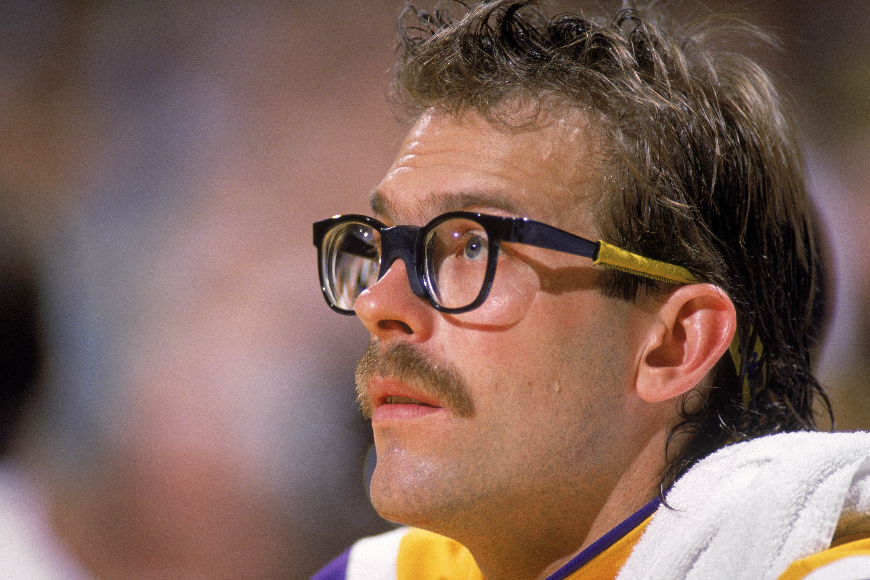 LOS ANGELES - 1987:  Kurt Rambis #31 of the Los Angeles Lakers sits on the bench during an NBA game at the Great Western Forum in Los Angeles, California in 1987. (Photo by: Mike Powell/Getty Images)