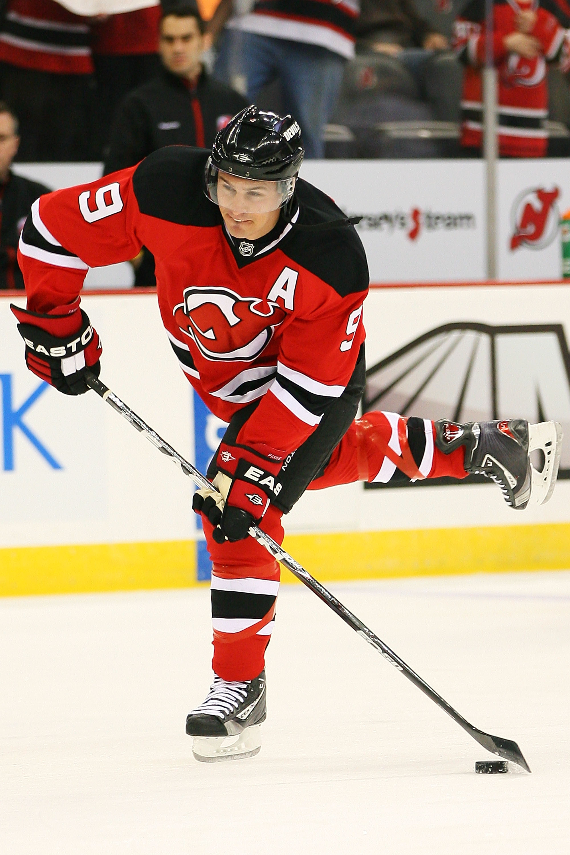 New Jersey Devils' Zach Parise celebrates after scoring an empty-net goal  during the third period of an NHL hockey game against the New York Rangers  on Monday, Feb. 9, 2009 in Newark