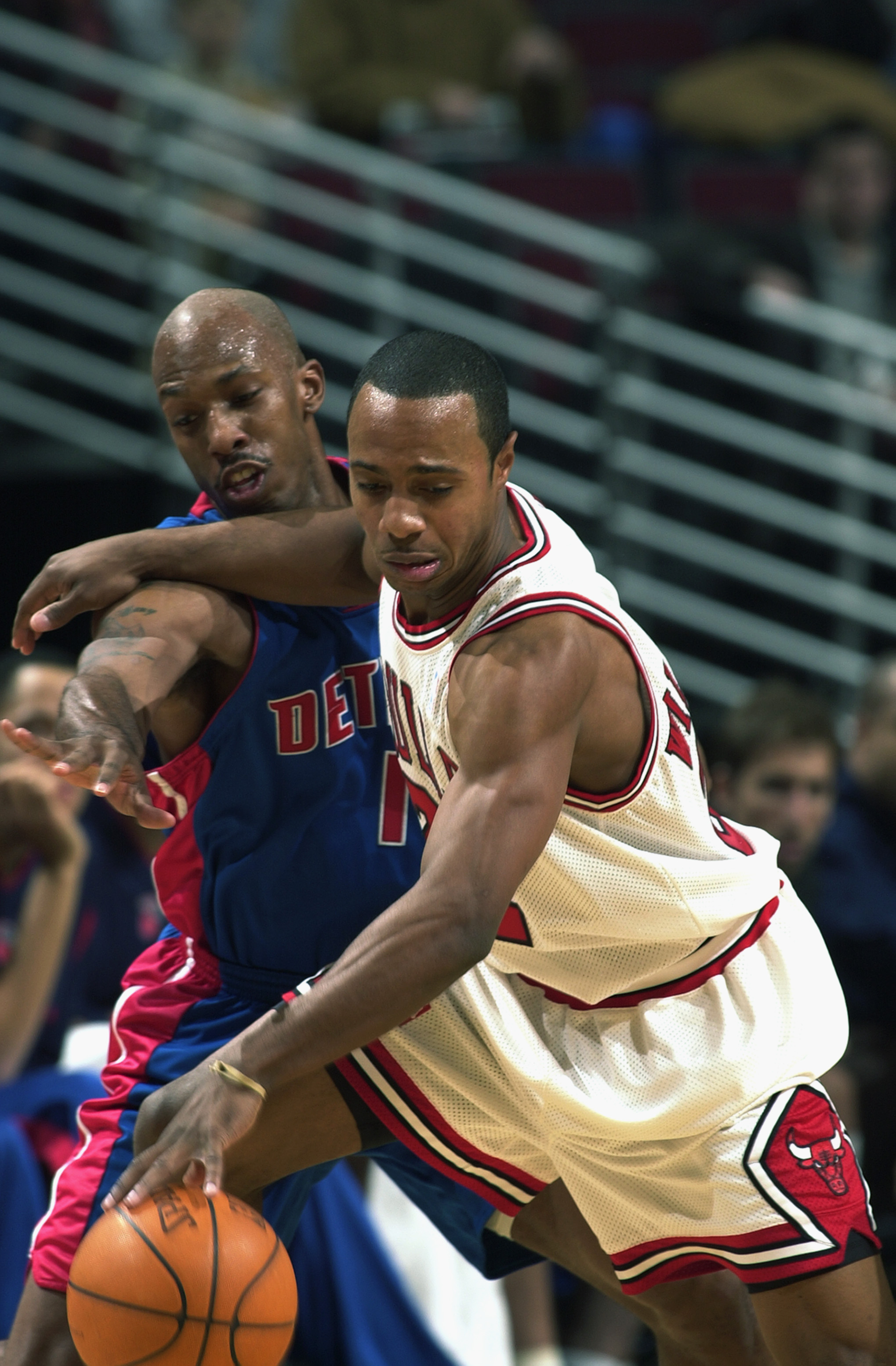 CHICAGO - DECEMBER 12:  Jay Williams #22 of the Chicago Bulls protects the ball during the NBA game against the Detroit Pistons at the United Center on December 12, 2002 in Chicago, Illinois. The Pistons won 86-76.  NOTE TO USER:  User expressly acknowled
