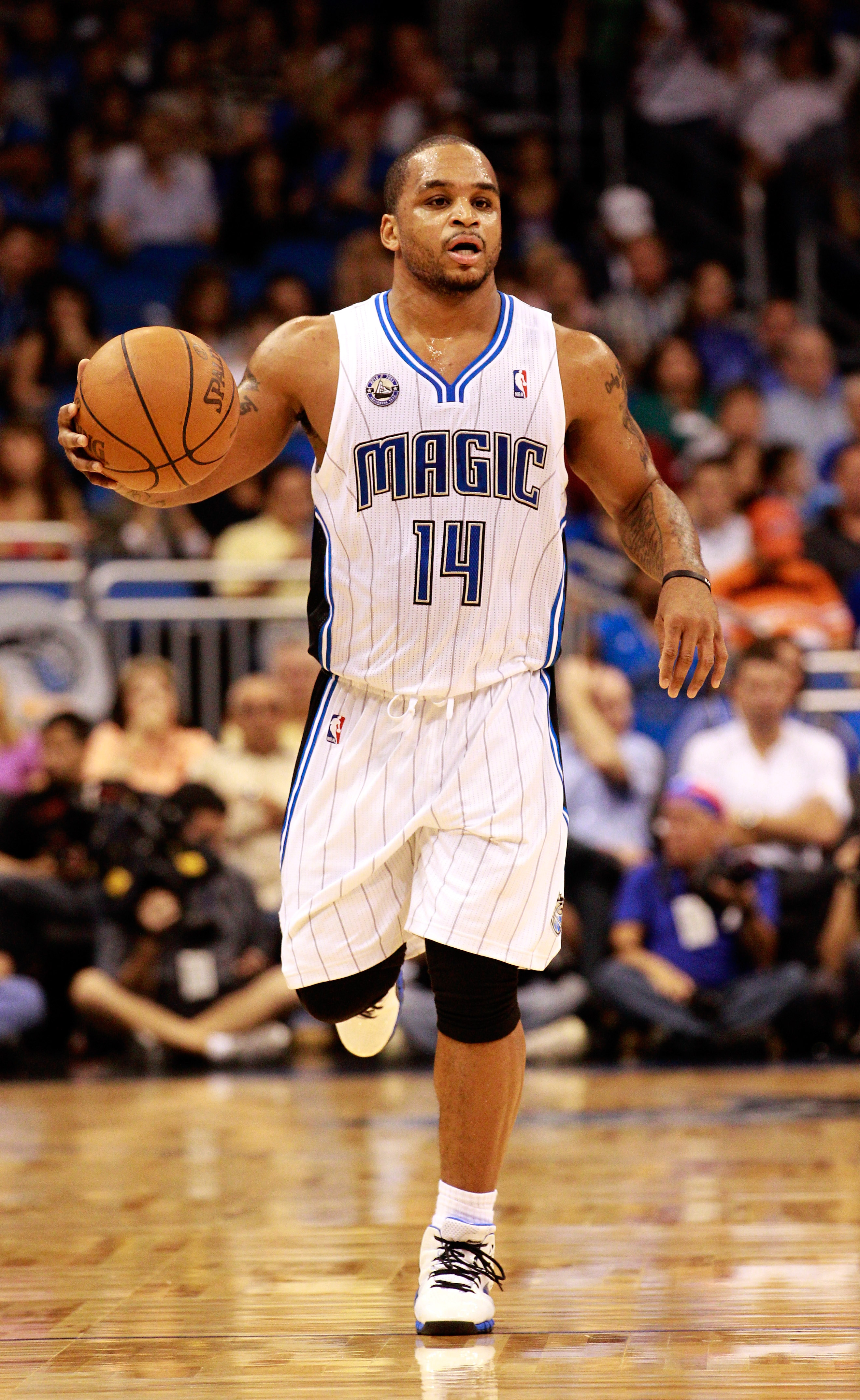 ORLANDO, FL - NOVEMBER 03:  Jameer Nelson #14 of the Orlando Magic sets up the offesnse during the game against the Minnesota Timberwolves at Amway Arena on November 3, 2010 in Orlando, Florida.  NOTE TO USER: User expressly acknowledges and agrees that,