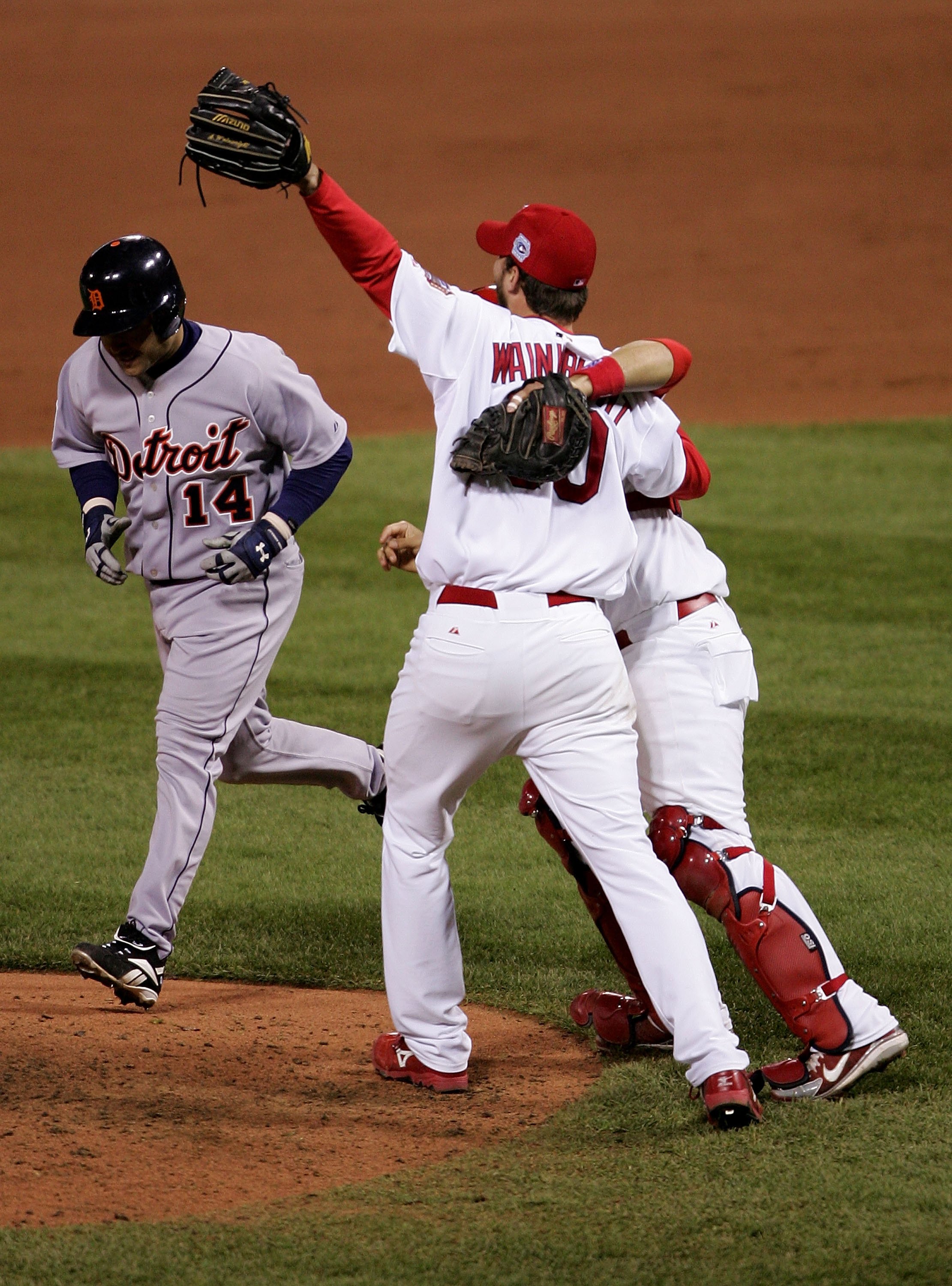 ST LOUIS, MO - OCTOBER 27:  Closing pitcher Adam Wainwright #50 and catcher Yadier Molina #4 of the St. Louis Cardinals celebrate the final out of their 4-2 victory to win the World Series against the Detroit Tigers during Game Five of the 2006 World Seri