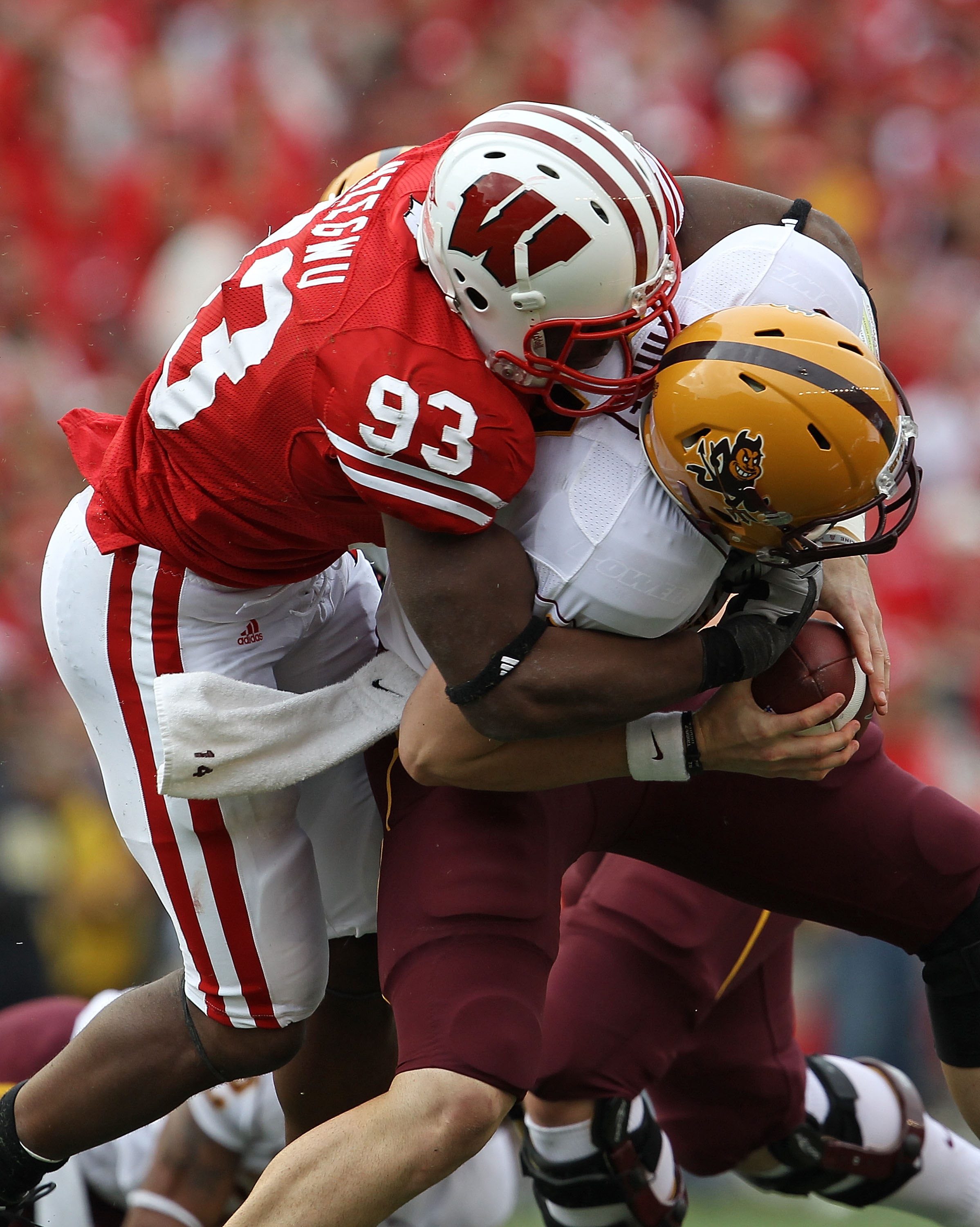 MADISON, WI - SEPTEMBER 18: Louis Nzegwu #93 of the Wisconsin Badgers sacks Steven Threet #14 of the Arizona State Sun Devils at Camp Randall Stadium on September 18, 2010 in Madison, Wisconsin. Wisconsin defeated Arizona State 20-19. (Photo by Jonathan