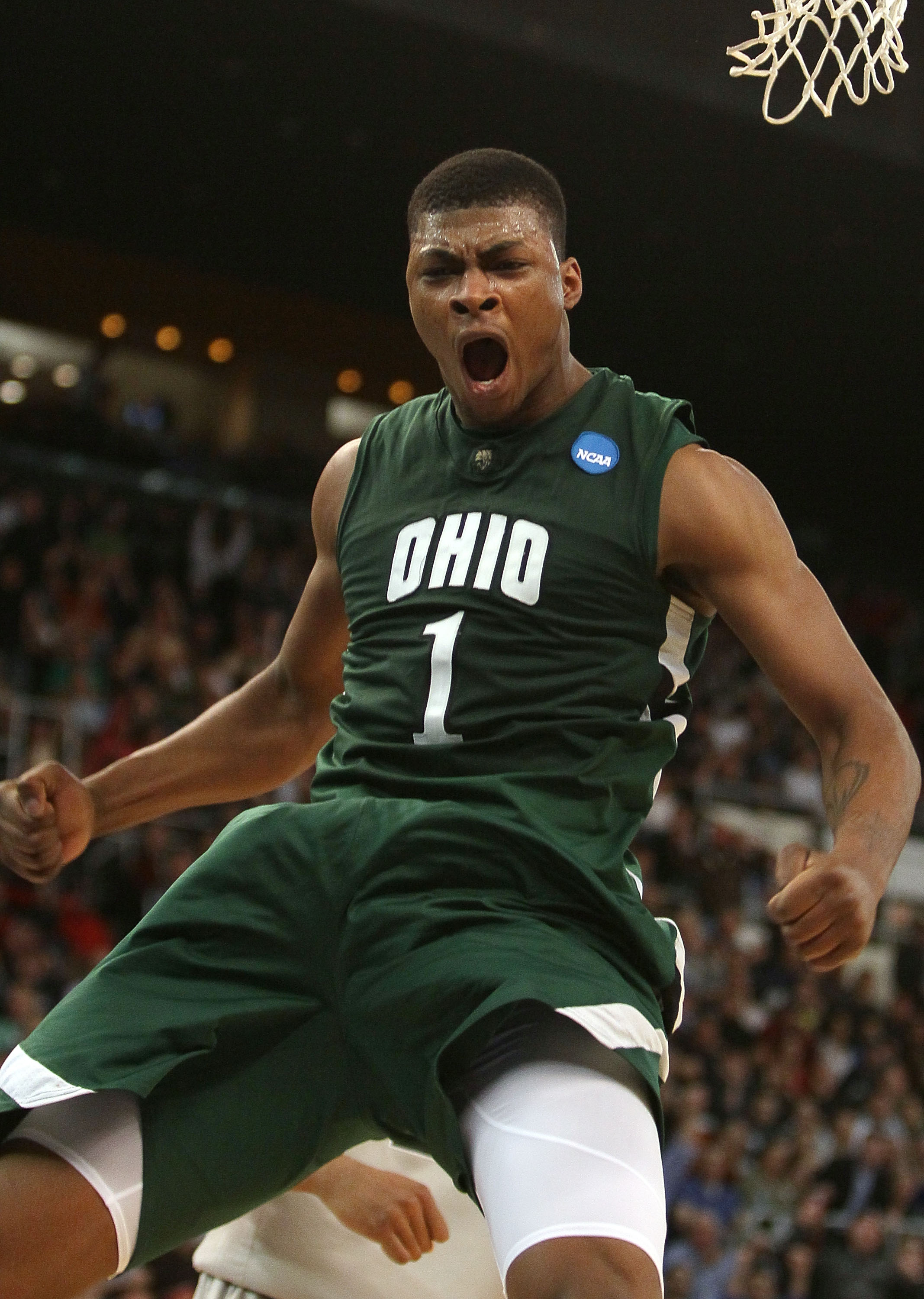 PROVIDENCE, RI - MARCH 18: DeVaughn Washington #1 of the Ohio Bobcats celebrates his dunk in the second half against the Georgetown Hoyas during the first round of the 2010 NCAA men's basketball tournament on March 18, 2010 at the Dunkin Donuts Arena in