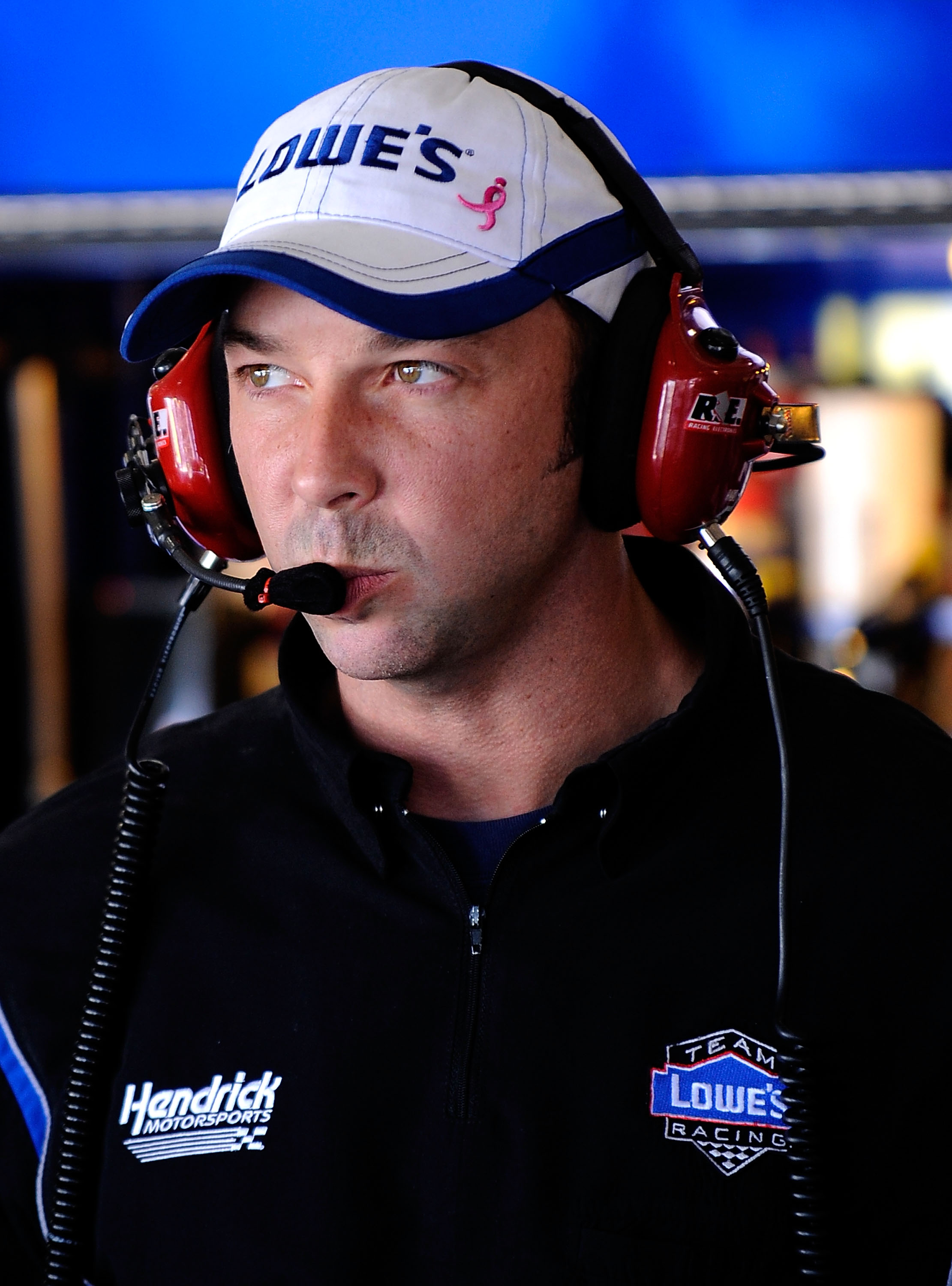 FONTANA, CA - OCTOBER 08:  Chad Knaus, crew chief for Jimmie Johnson, driver of the #48 Lowe's/Jimmie Johnson Foundation Chevrolet, stands in the garage during practice for the NASCAR Sprint Cup Series Pepsi Max 400 on October 8, 2010 in Fontana, Californ