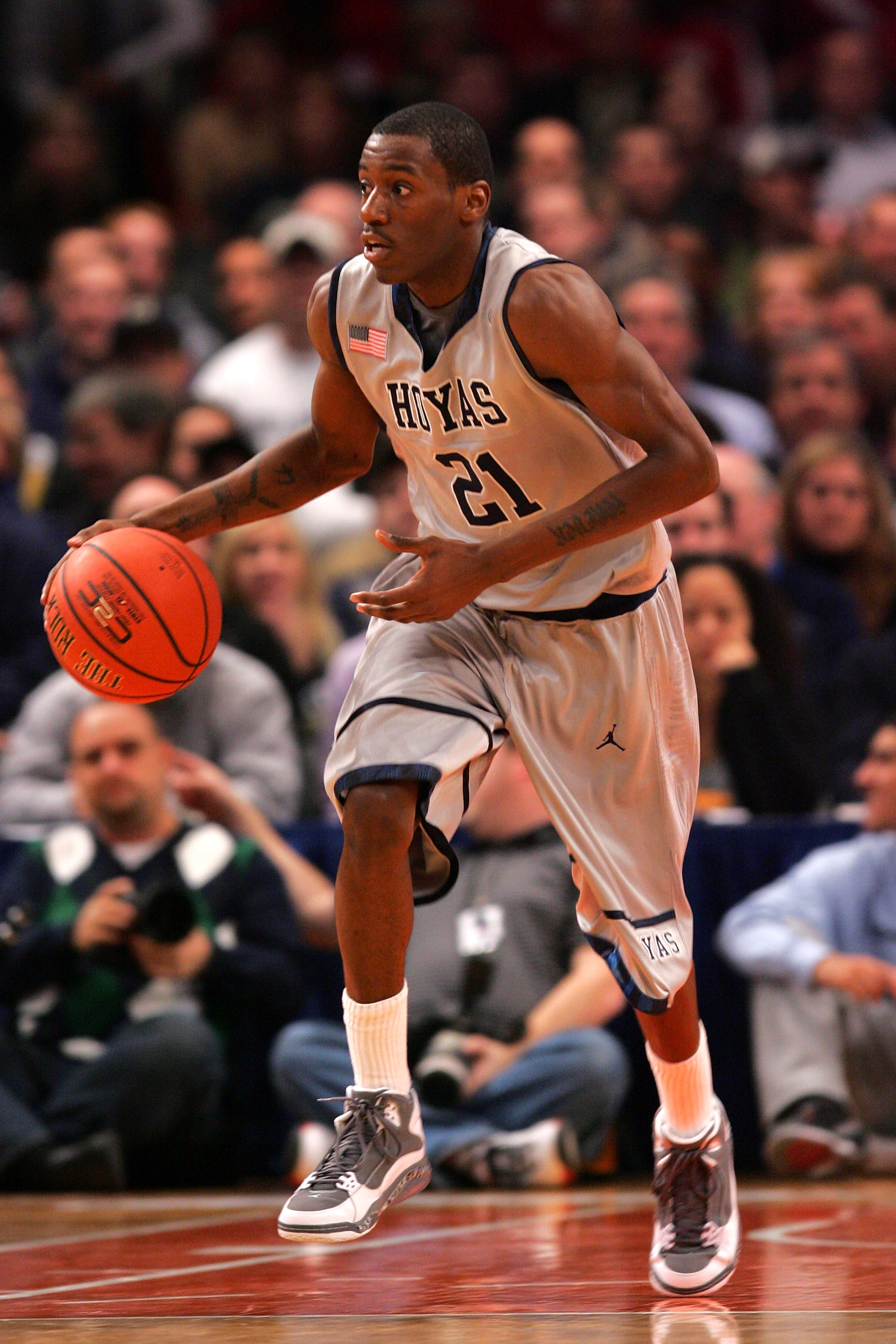 NEW YORK - DECEMBER 08: Jason Clark #21 of the Georgetown Hoyas dribbles the ball against the Butler Bulldogs during the Jimmy V Classic at Madison Square Garden on December 8, 2009 in New York, New York. The Hoyas defeated the Bulldogs 72-65. (Photo by