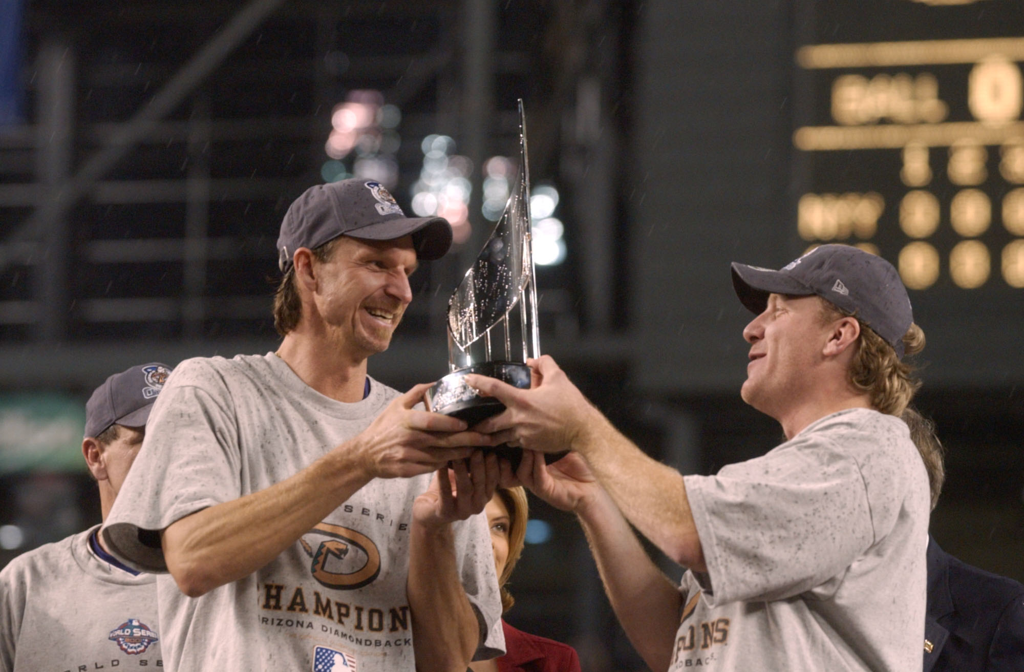 4 Nov 2001:  Co-MVP winners Randy Johnson #51 and Curt Schilling #38 of the Arizona Diamondbacks hold the trophys after game seven of the Major League Baseball World Series at Bank One Ballpark in Phoenix, Arizona. The Diamondbacks won 3-2 to capture the