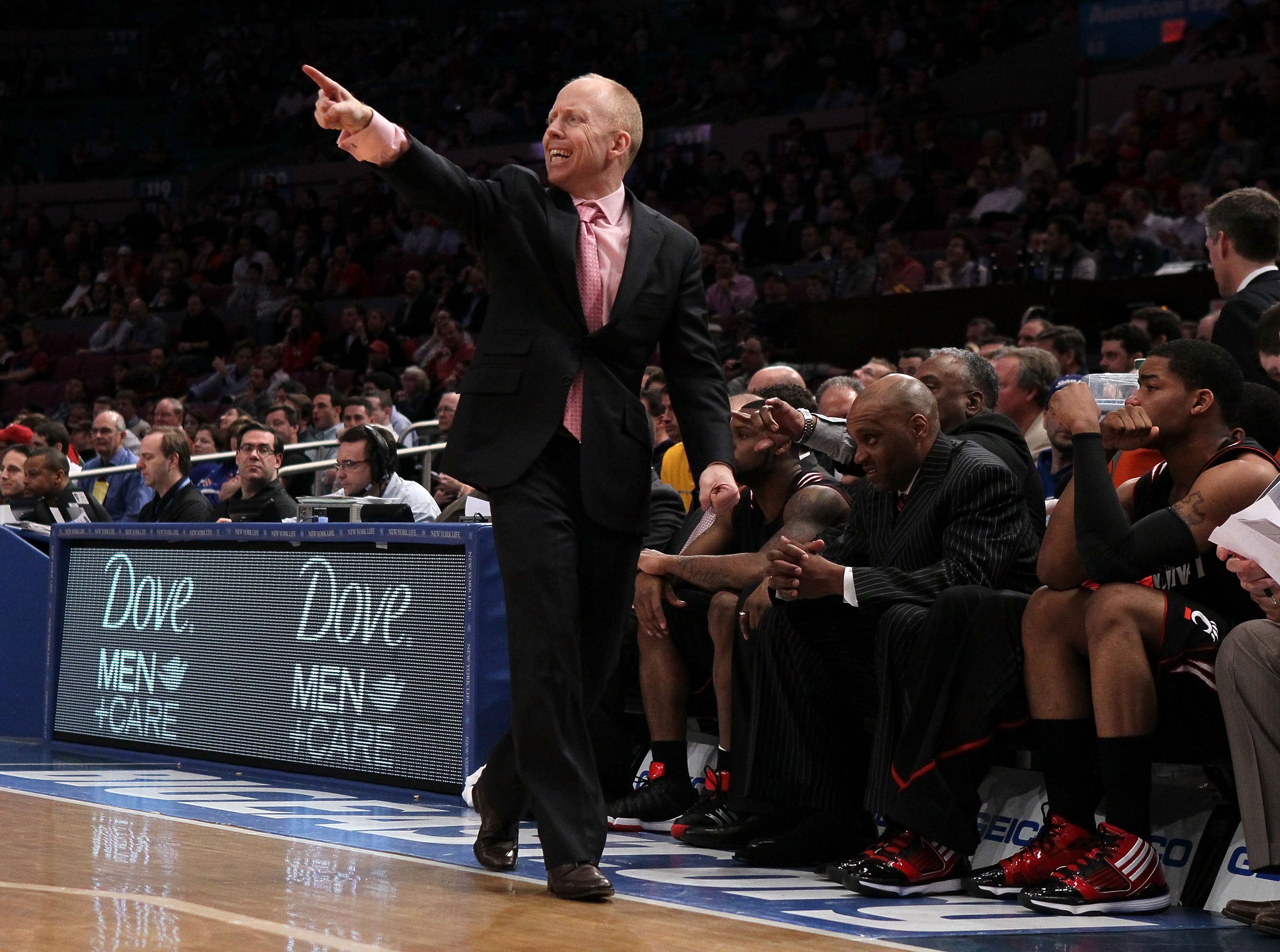 NEW YORK - MARCH 10: Head coach Mick Cronin of the Cincinnati Bearcats gestures from the bench against the Louisville Cardinals during the second round of 2010 NCAA Big East Tournament at Madison Square Garden on March 10, 2010 in New York City. (Photo