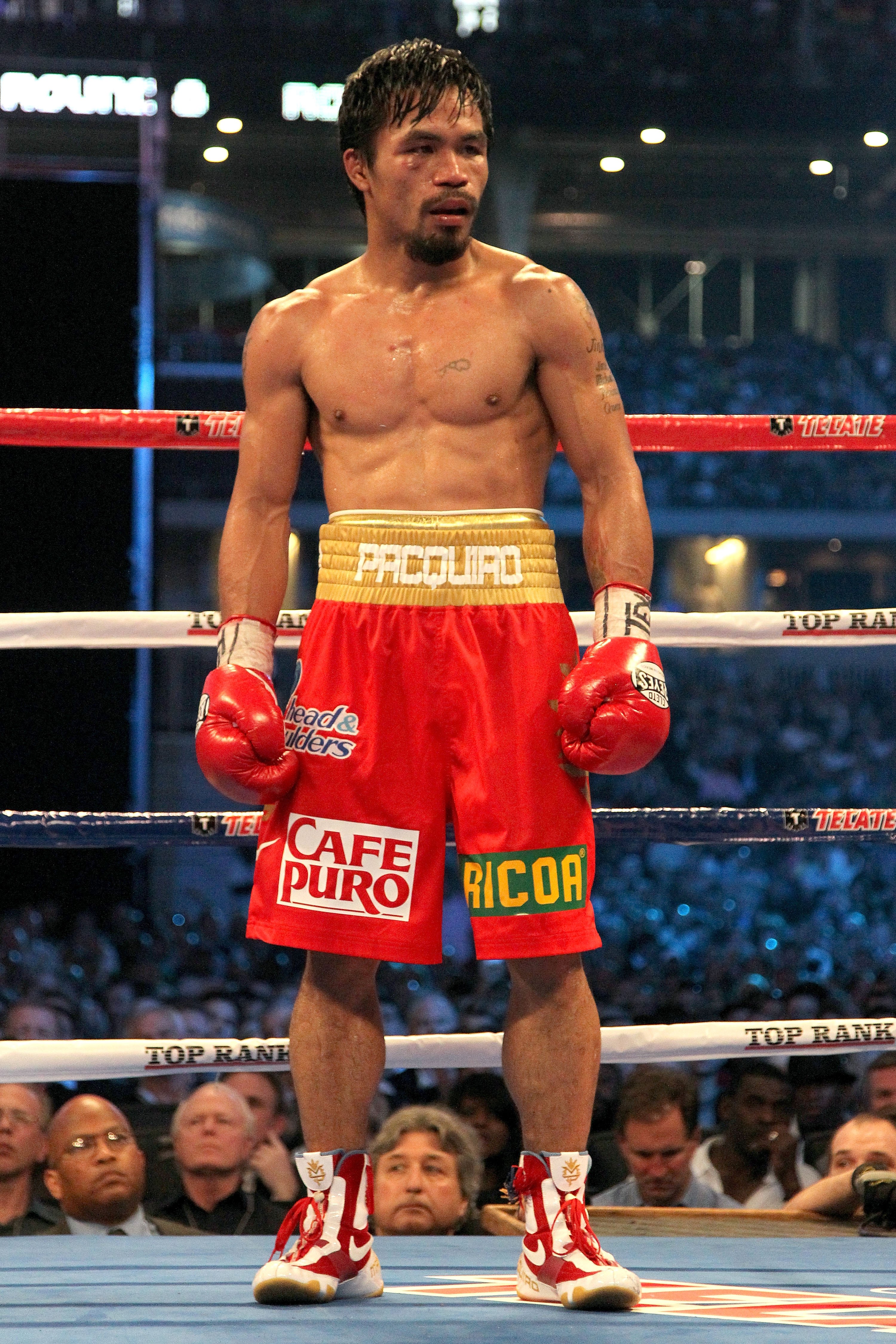 ARLINGTON, TX - MARCH 13: Manny Pacquiao of the Philippines looks on in the ring against Joshua Clottey of Ghana during the WBO welterweight title fight at Cowboys Stadium on March 13, 2010 in Arlington, Texas. Pacquiao defeated Clottey by unanimous deci