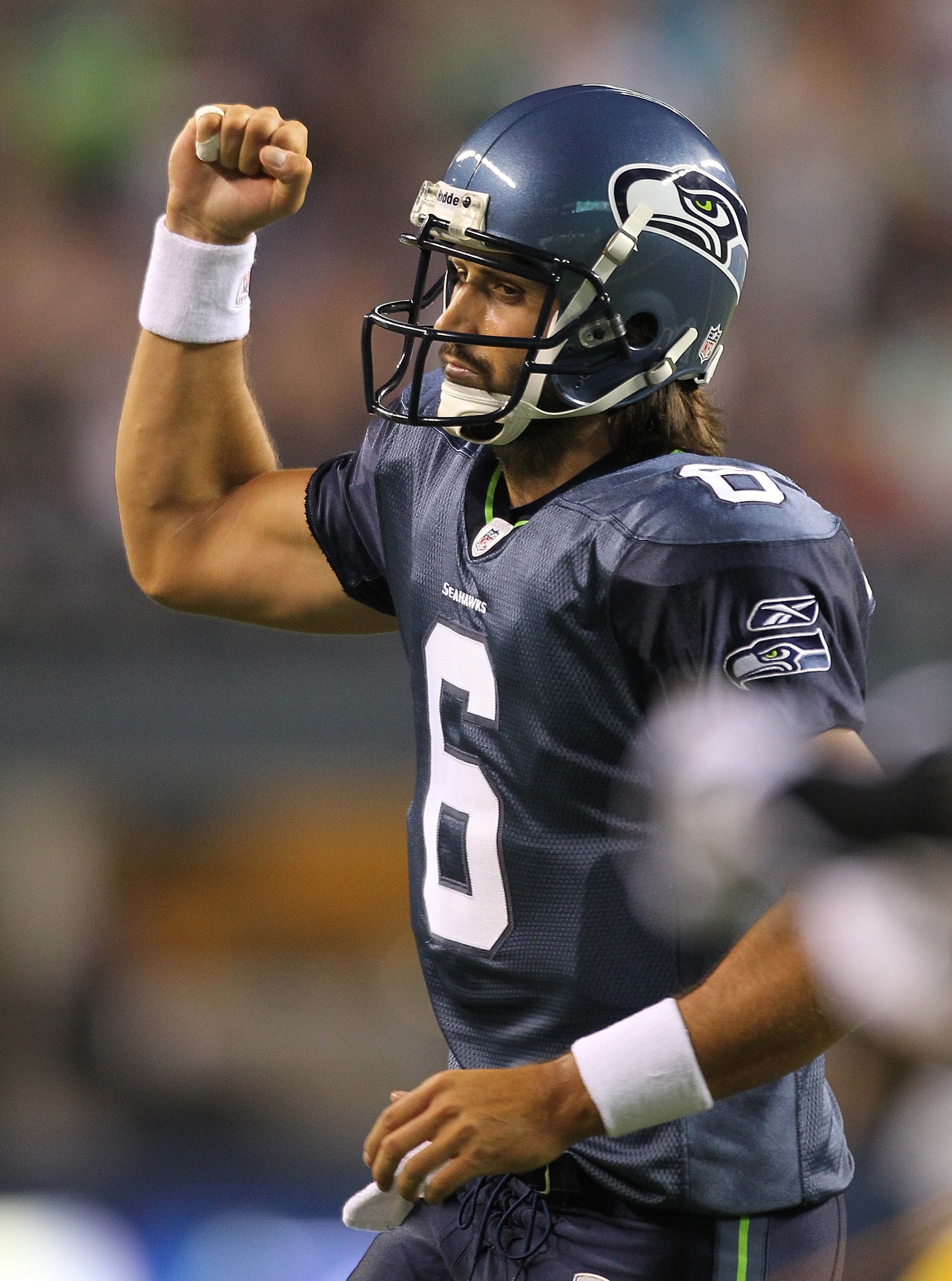 Seattle Seahawks Charlie Whitehurst rolls out of the pocket in the fourth  quarter against the New York Giants in week 5 of the NFL season at MetLife  Stadium in East Rutherford, New Jersey on October 9, 2011. The Seahawks  defeated the Giants 36-25. UPI