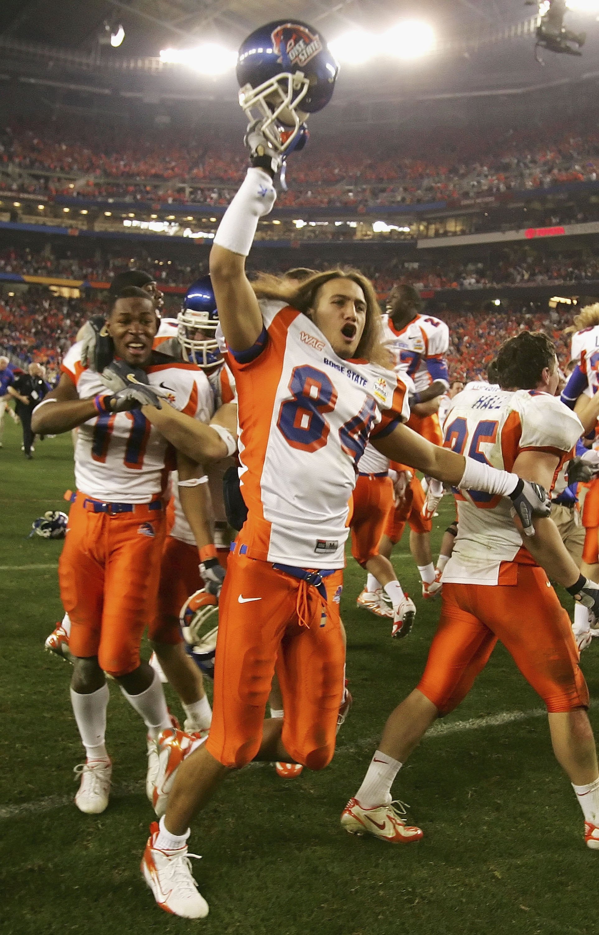 GLENDALE, AZ - JANUARY 01:  Aiona Key #84 of the Boise State Broncos celebates after defeating the Oklahoma Sooners 43-42 at the Tostito's Fiesta Bowl at University of Phoenix Stadium on January 1, 2007 in Glendale, Arizona.  (Photo by Jonathan Ferrey/Get