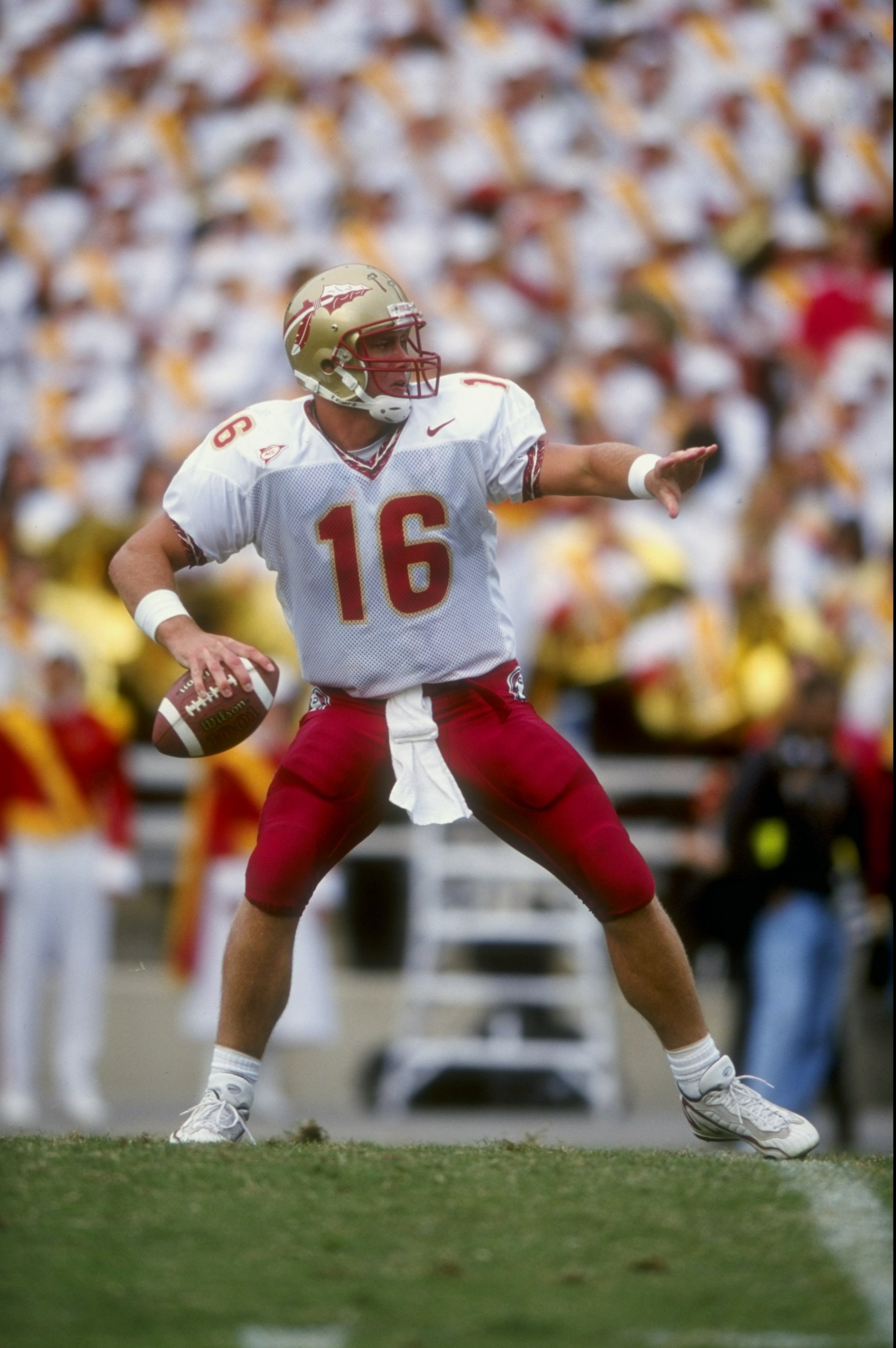 3 Oct 1998:  Quarterback Chris Weinke #16 of the Florida State Seminoles prepares to throw a pass during a game against the Maryland Terrapins at the Byrd Stadium in College Park, Maryland. The Seminoles defeated the Terrapins 24-10.