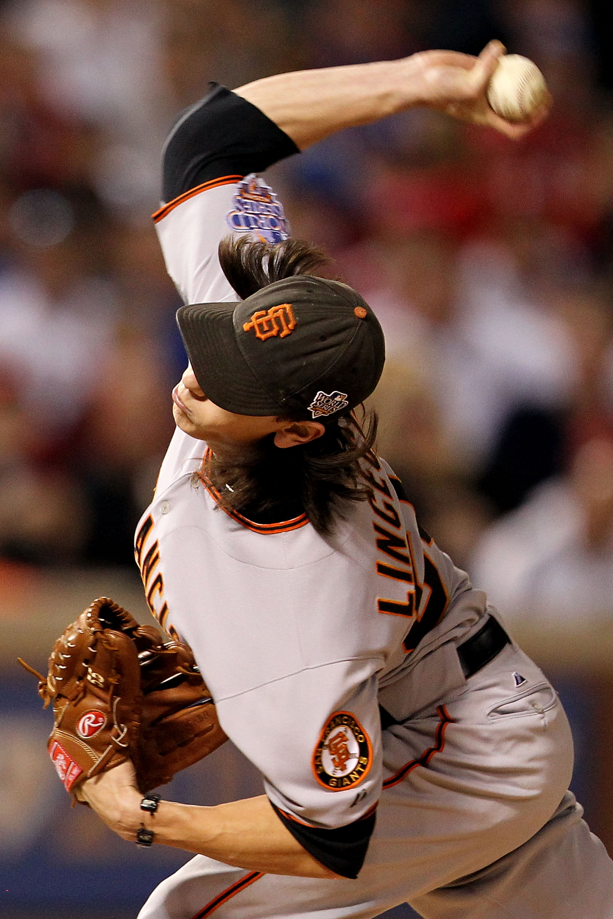 ARLINGTON, TX - NOVEMBER 01:  Starting pitcher Tim Lincecum #55 of the San Francisco Giants pitches against the Texas Rangers in Game Five of the 2010 MLB World Series at Rangers Ballpark in Arlington on November 1, 2010 in Arlington, Texas.  (Photo by Ro