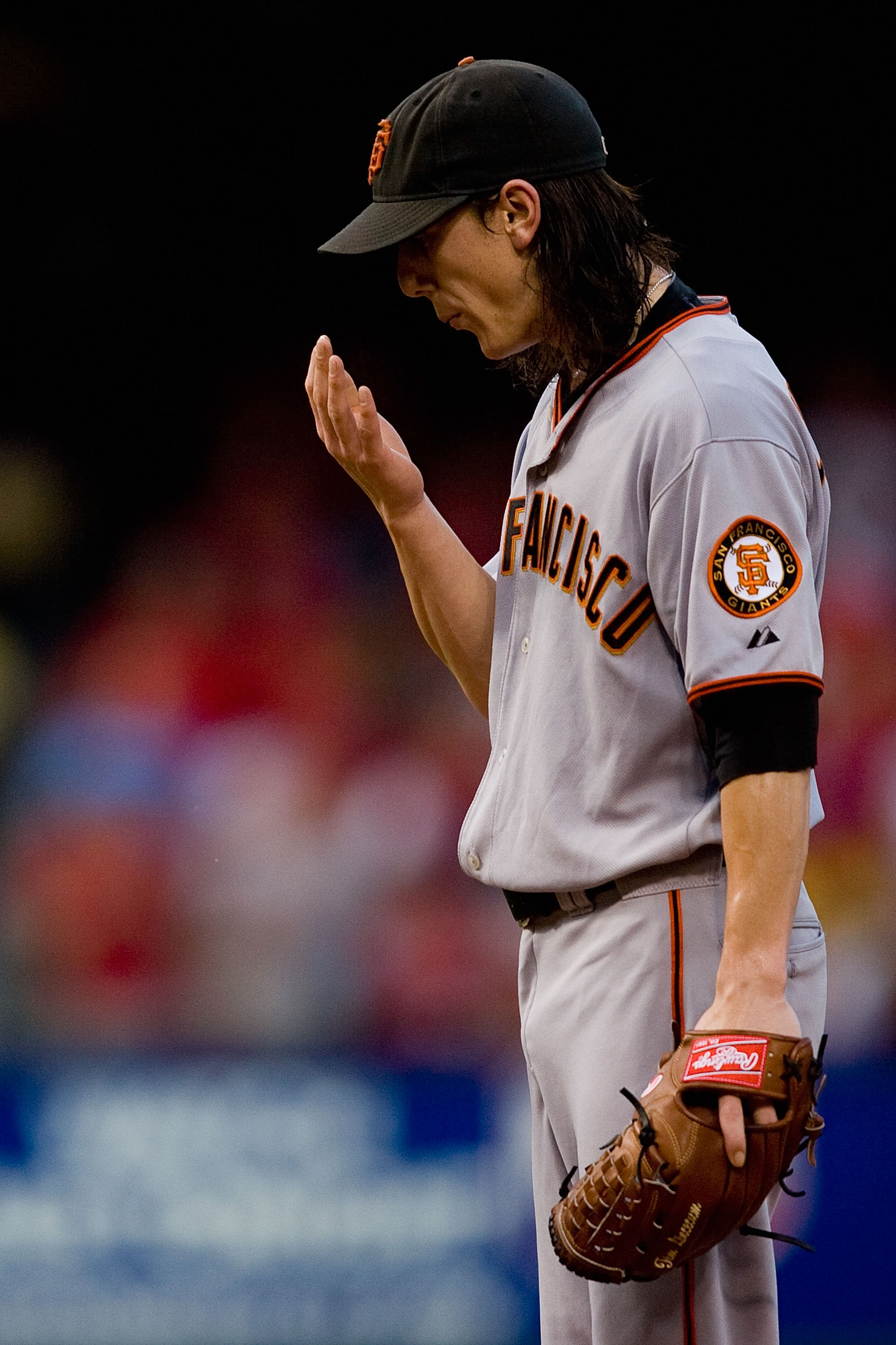 ST. LOUIS - AUGUST 21: Starter Tim Lincecum #55 of the San Francisco Giants reacts to giving up a home run against the St. Louis Cardinals at Busch Stadium on August 21, 2010 in St. Louis, Missouri.  (Photo by Dilip Vishwanat/Getty Images)