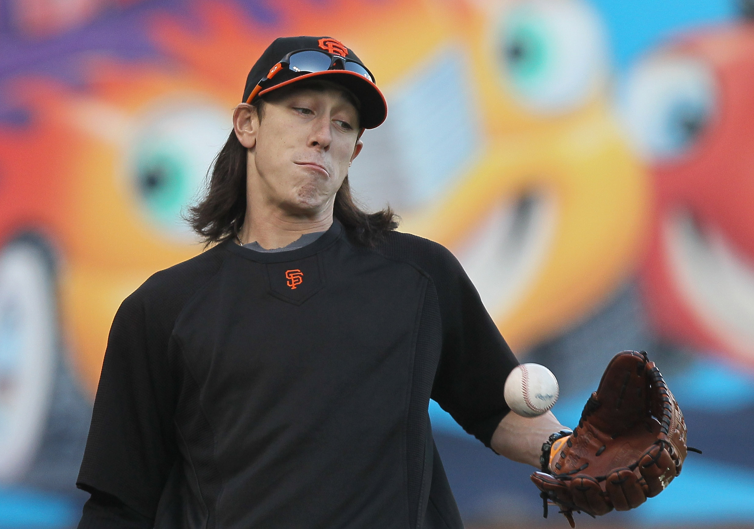 SAN FRANCISCO - OCTOBER 25:  Tim Lincecum #55 of the San Francisco Giants plays catch during a team workout at AT&T Park on October 25, 2010 in San Francisco, California. The Giants are preparing to face the Texas Rangers in the 2010 World Series.  (Photo