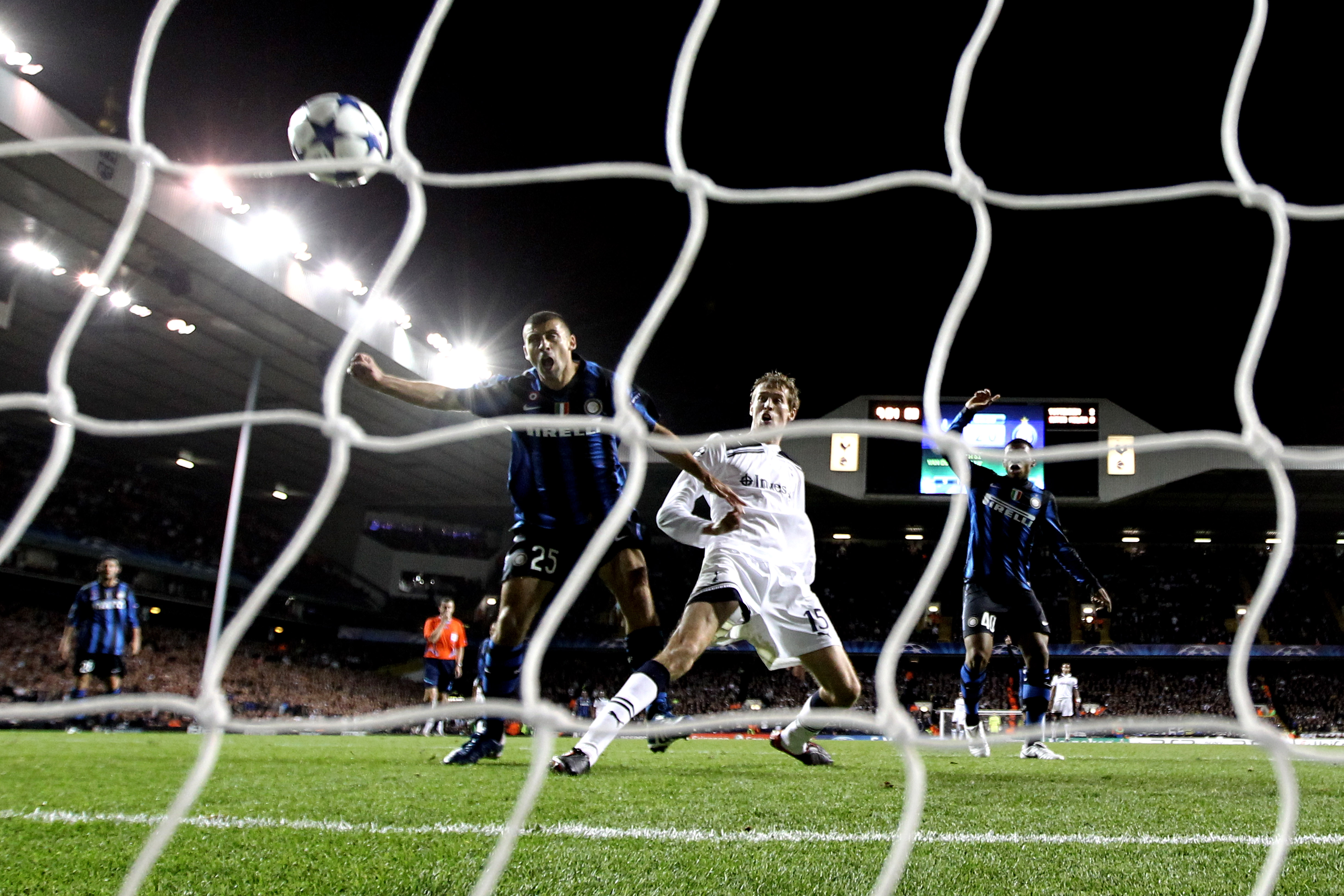 LONDON, ENGLAND - NOVEMBER 02:  Peter Crouch of Spurs gets infront of Walter Samuel of Inter Milan to prod the ball into the net, but the goal is disaallowed during the UEFA Champions League Group A match between Tottenham Hotspur and Inter Milan at White