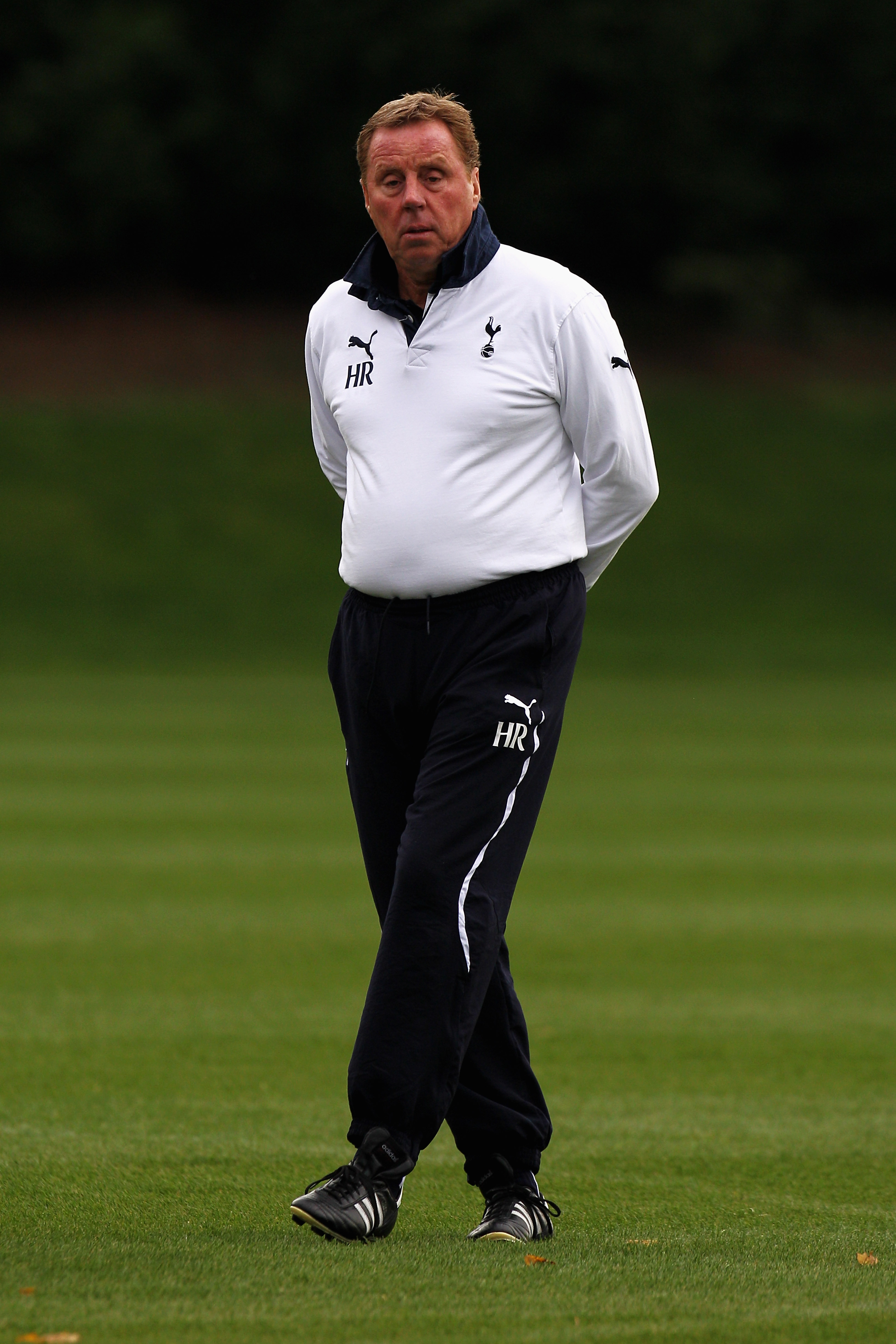 LONDON, ENGLAND - NOVEMBER 01:  Tottenham Manager,  Harry Redknapp looks on during the Tottenham Hotspur training session ahead of their UEFA Champions League group stage match against Inter Milan at Tottenham Hotspur Training Ground on November 1, 2010 i