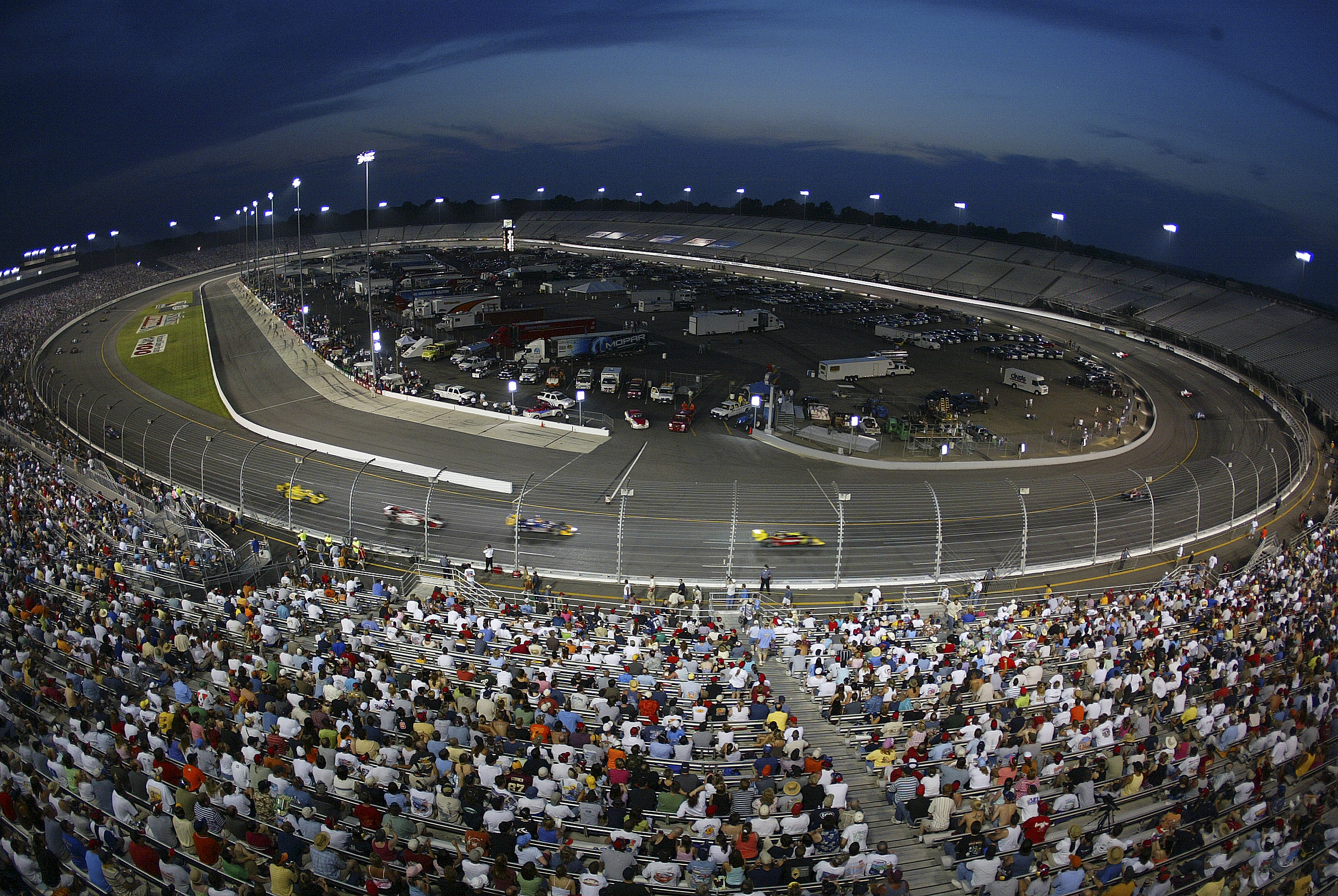 RICHMOND, VA - JUNE 25: The field make their way around the three-quarter mile oval during the Indy Racing League SunTrust Indy Challenge on June 25, 2005 at the Richmond International Raceway, Richmond. (Photo by Gavin Lawrence/Getty Images)