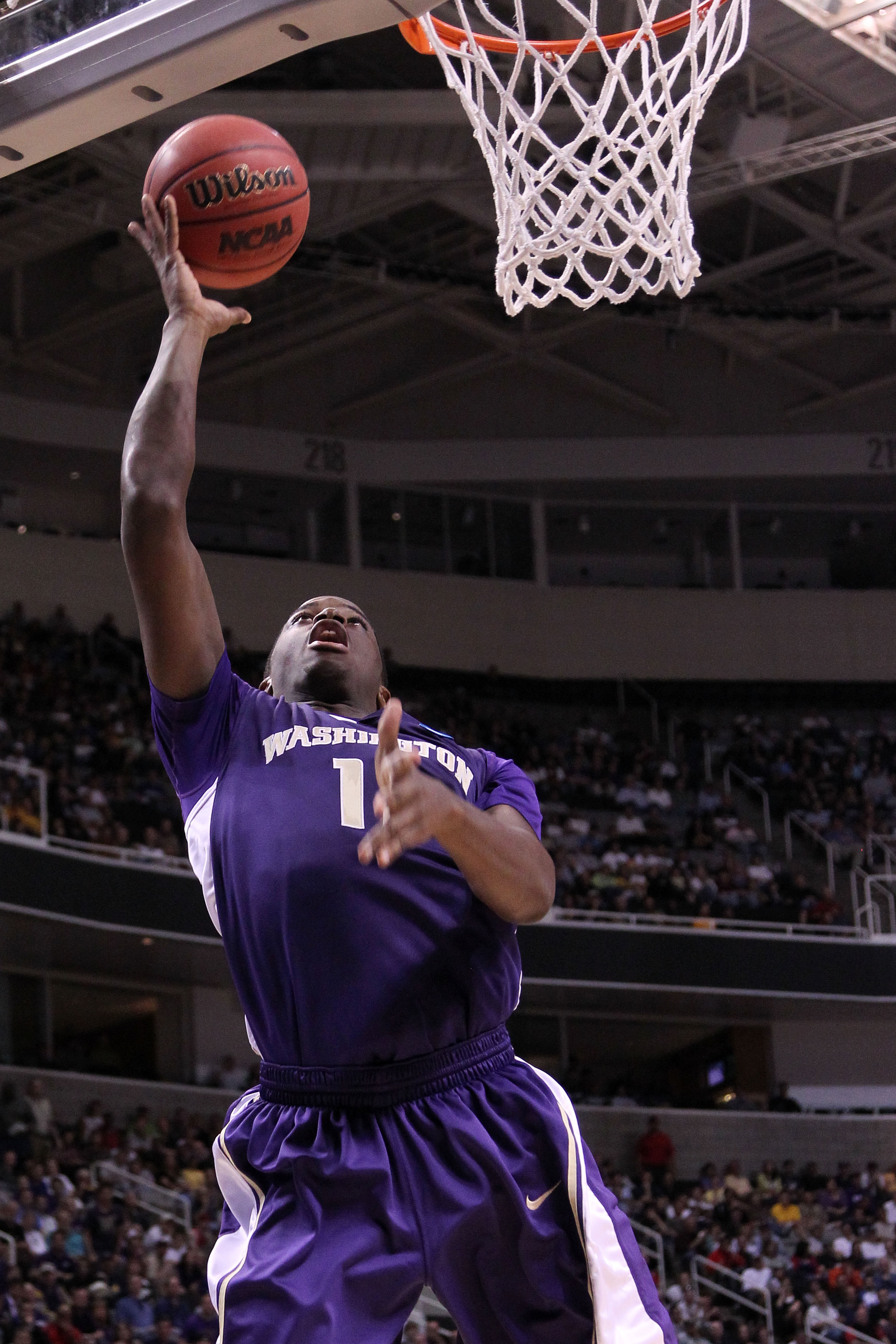 SAN JOSE, CA - MARCH 20: Forward Matthew Bryan-Amaning #11 of the Washington Huskies takes a shot against the New Mexico Lobos during the second round of the 2010 NCAA men's basketball tournament at HP Pavilion on March 20, 2010 in San Jose, California.