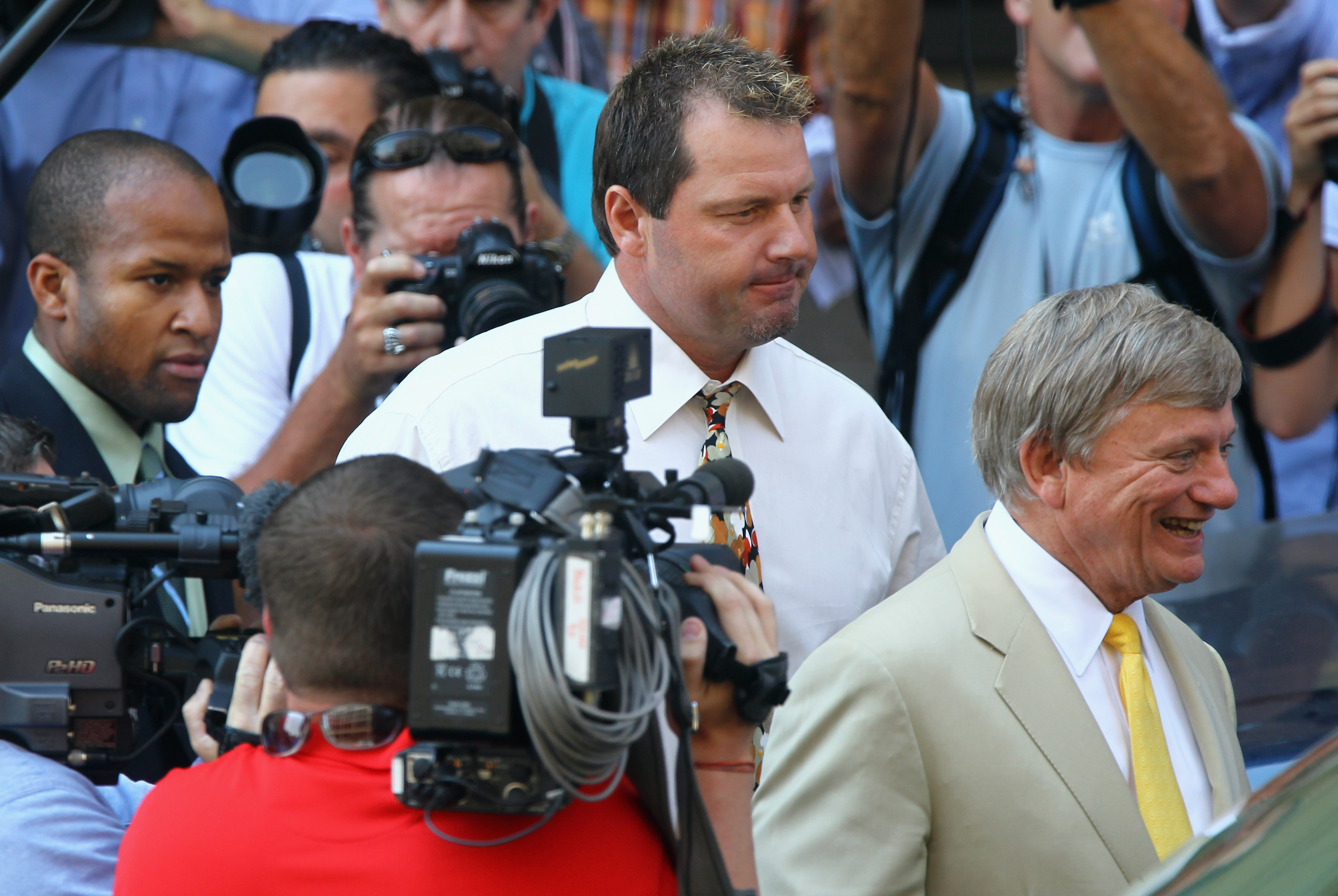 WASHINGTON - AUGUST 30:  Baseball pitching star Roger Clemens walks out of the U.S. District Court after his arraignment, on August 30, 2010 in Washington, DC. Seven-time Cy Young Award winner Clemens who plead not-guilty was charged with making false sta