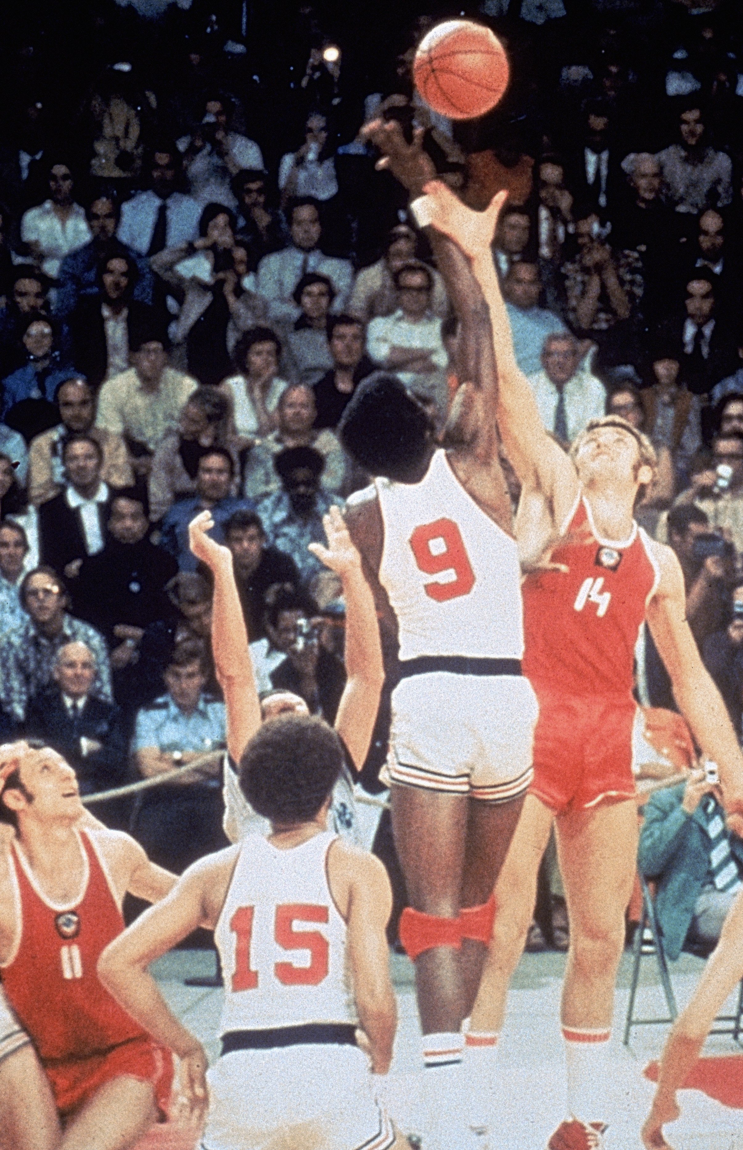MUNICH, GERMANY - SEPTEMBER 10:  USA Basketball team battles for the tip off against the Russia basketball team on September 10, 1972 in Munich, Germany. The Russia won this controversial game 51 to 50 after being given extra time to get a final shot off.