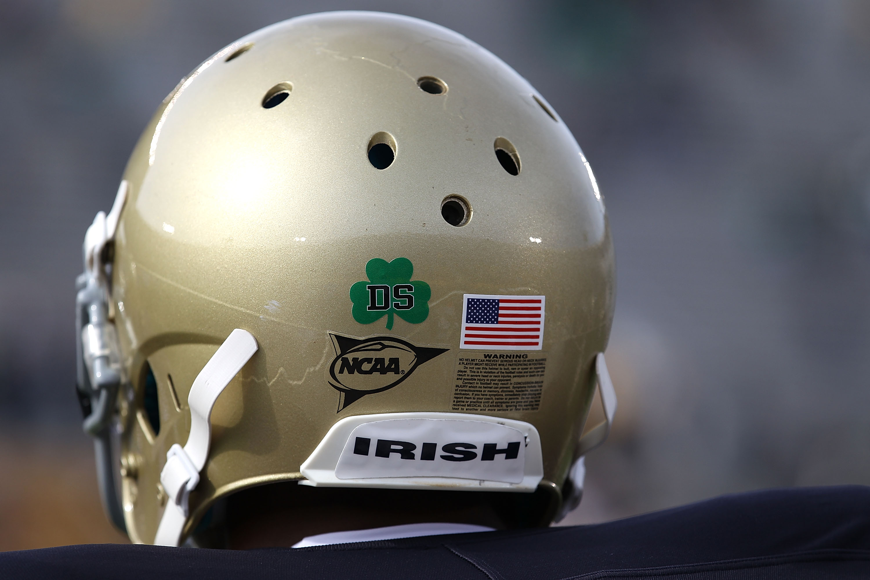 SOUTH BEND, IN - OCTOBER 30: A player for the Notre Dame Fighting Irish wears a decal on his helmut honoring Declan Sullivan, a student who was killed while videotaping a Notre Dame practice in high winds this past week, before a game against the Tulsa Go