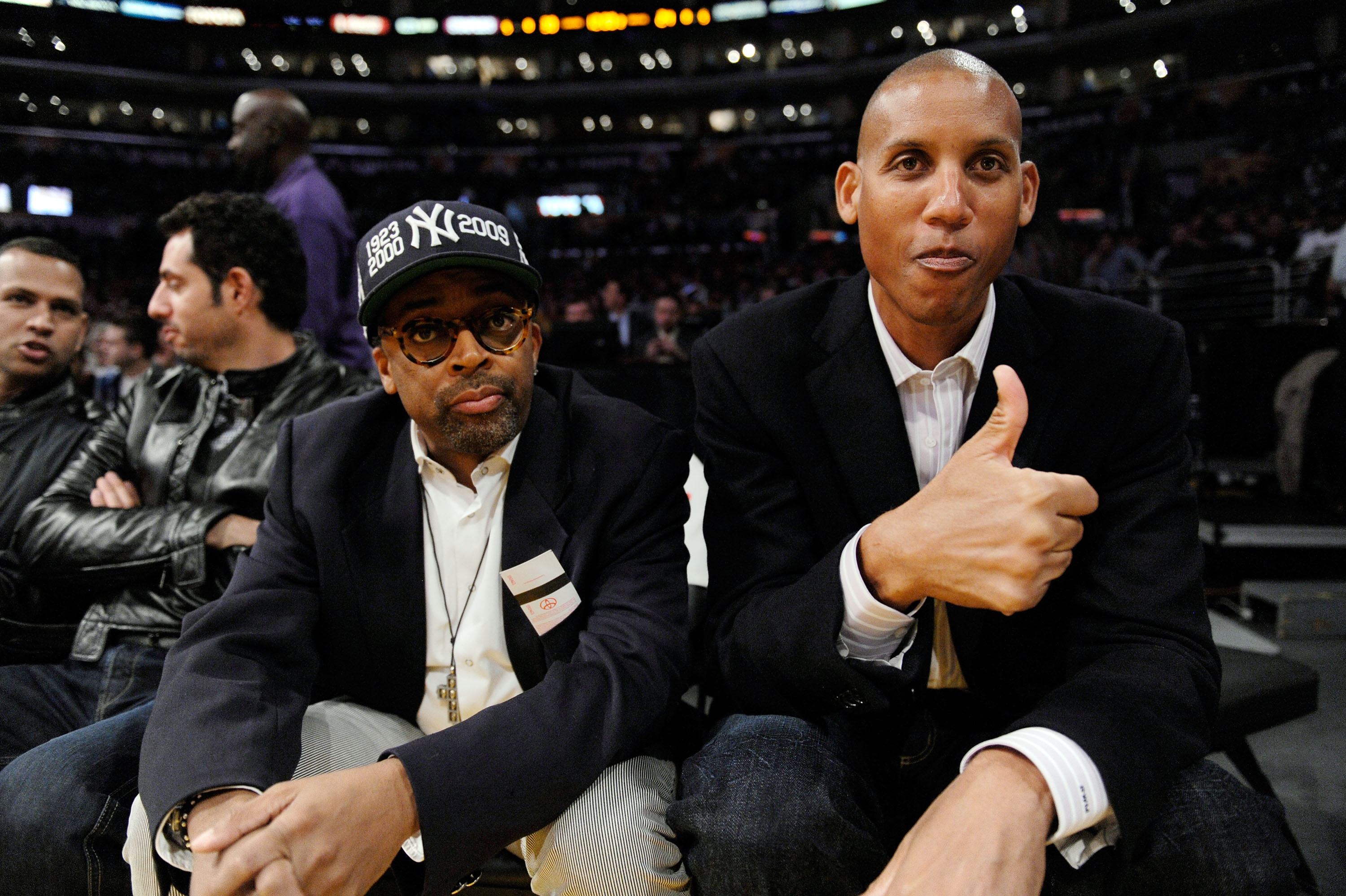 LOS ANGELES, CA - NOVEMBER 24: Former NBA star Reggie Miller of the Indiana Pacers and film maker Spike Lee look on during the NBA game between the New York Knicks and Los Angeles Lakers Staples Center on November 24, 2009 in Los Angeles, California.  NOT