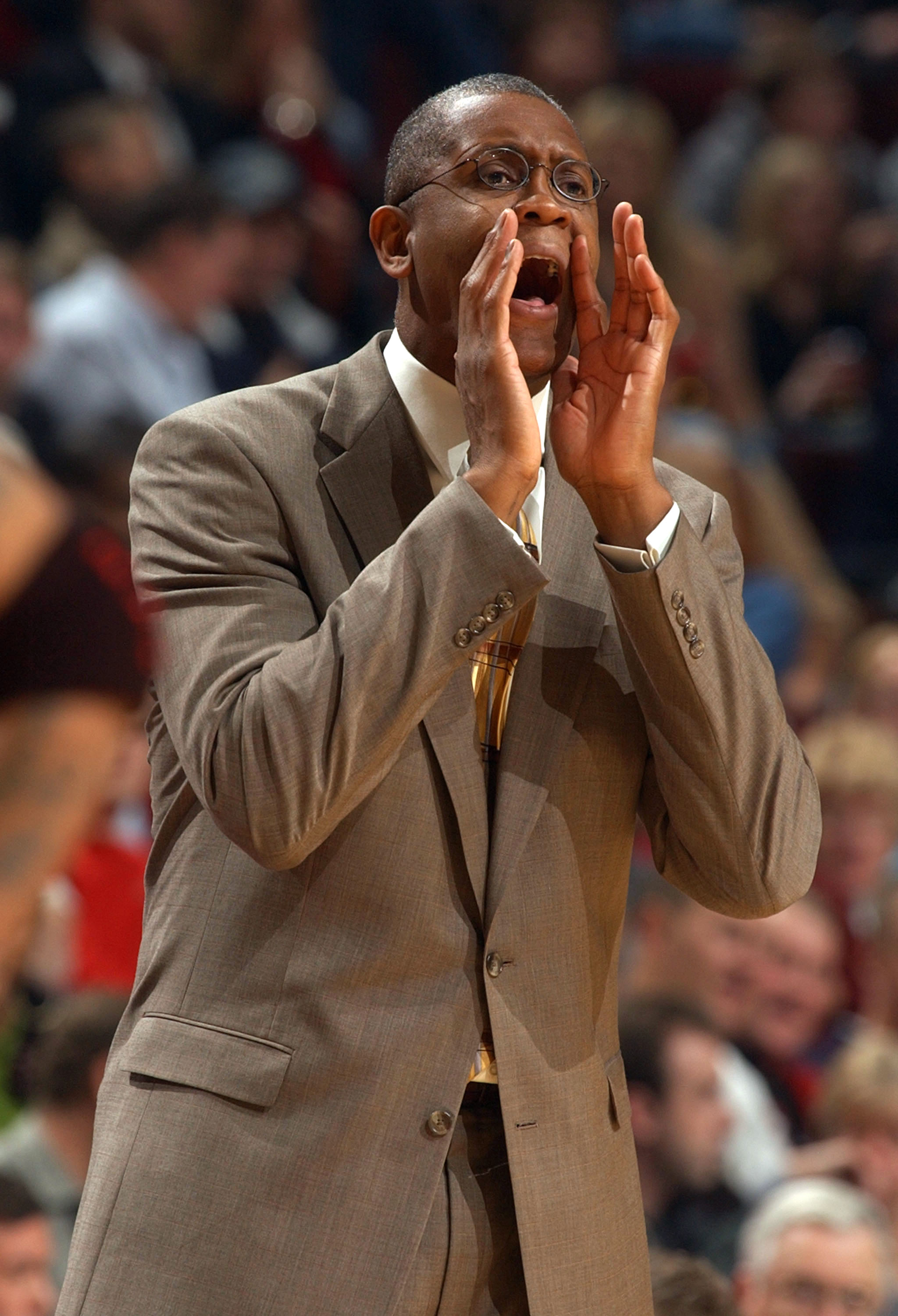CHICAGO - NOVEMBER 7:  Head coach Bill Cartwright of the Chicago Bulls yells instructions to his team during a game against the Philadelphia 76ers November 7, 2003 at the United Center in Chicago, Illinois. The 76ers defeated the Bulls 106-85. NOTE TO USE