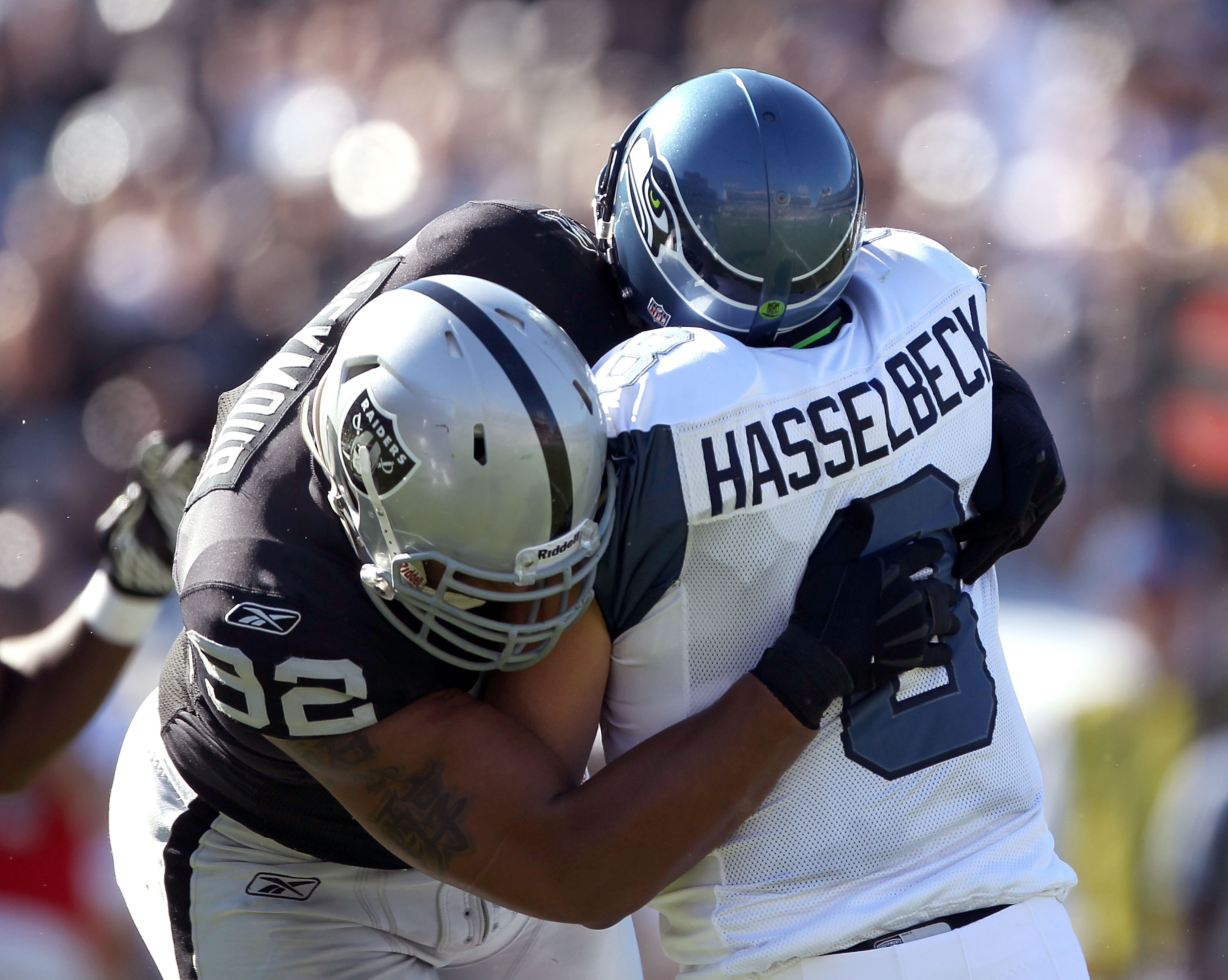 OAKLAND, CA - OCTOBER 31:  Matt Hasselbeck #8 of the Seattle Seahawks is tackled by Richard Seymour #92 of the Oakland Raiders at Oakland-Alameda County Coliseum on October 31, 2010 in Oakland, California.  (Photo by Ezra Shaw/Getty Images)