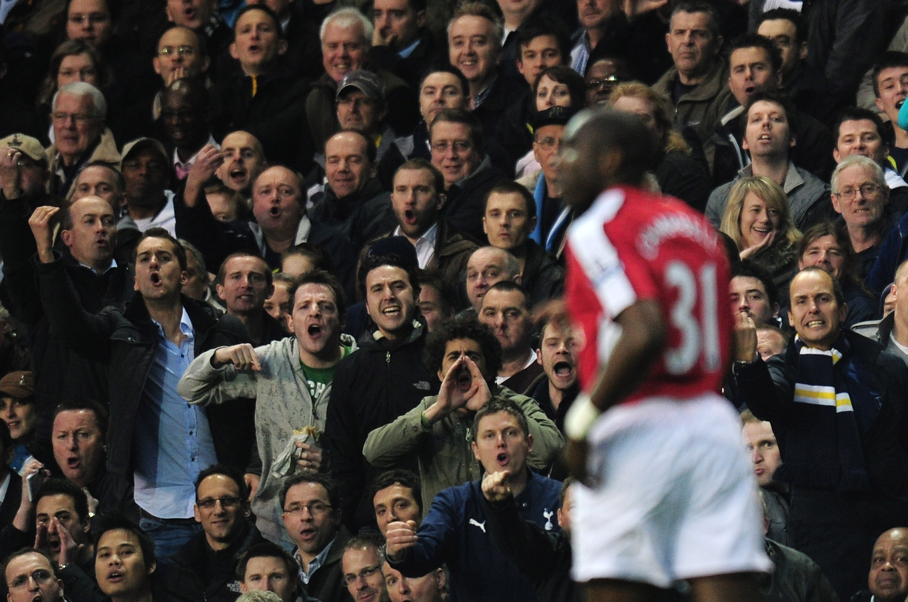 LONDON, ENGLAND - APRIL 14:  Tottenham Hotspur fans berate Sol Campbell of Arsenal during the Barclays Premier League match between Tottenham Hotspur and Arsenal at White Hart Lane on April 14, 2010 in London, England.  (Photo by Shaun Botterill/Getty Ima
