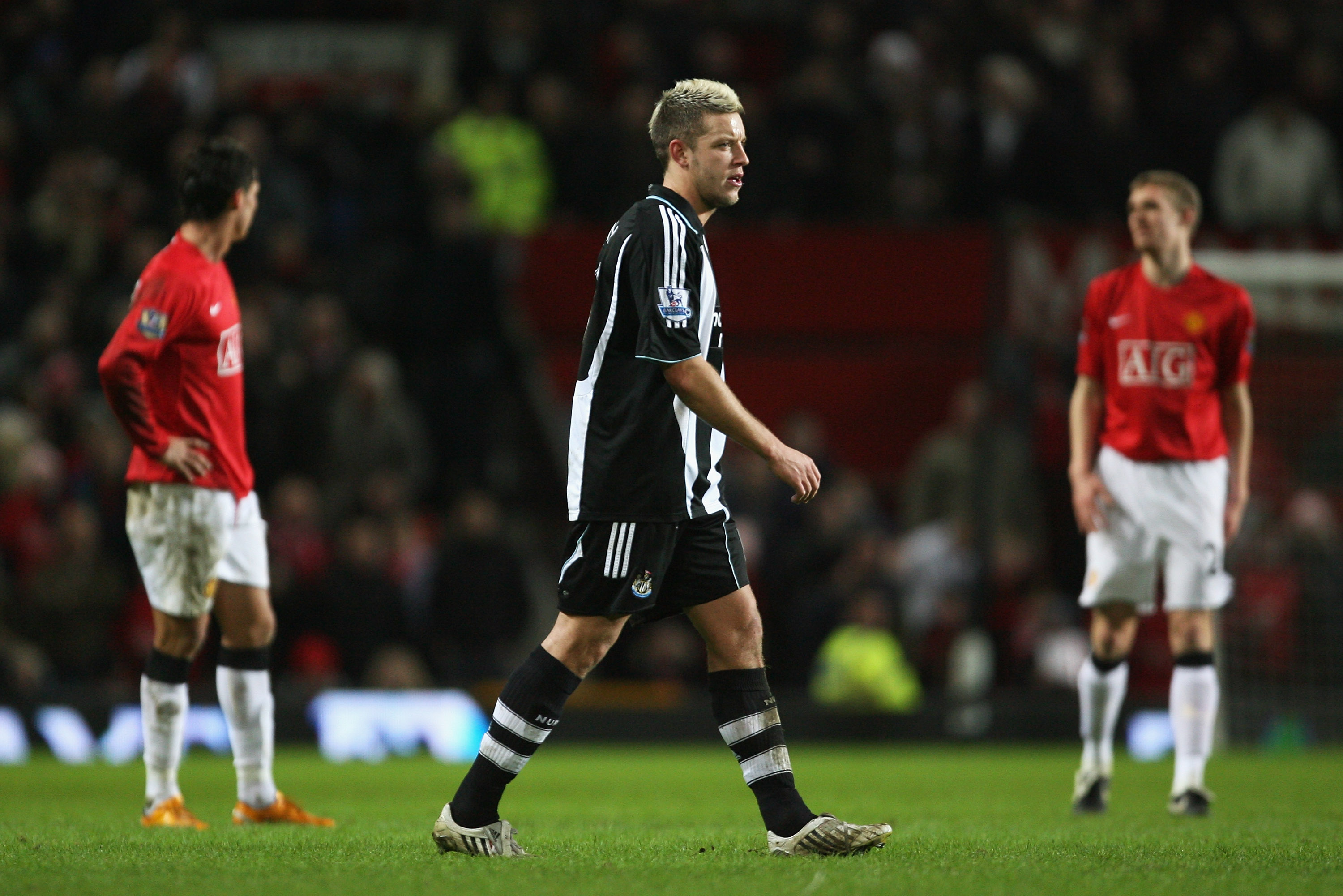 MANCHESTER, UNITED KINGDOM - JANUARY 12:  Alan Smith of Newcastle leaves the pitch after being shown the red card by Referee Rob Styles during the Barclays Premier League match between Manchester United and Newcastle United at Old Trafford on January 12,