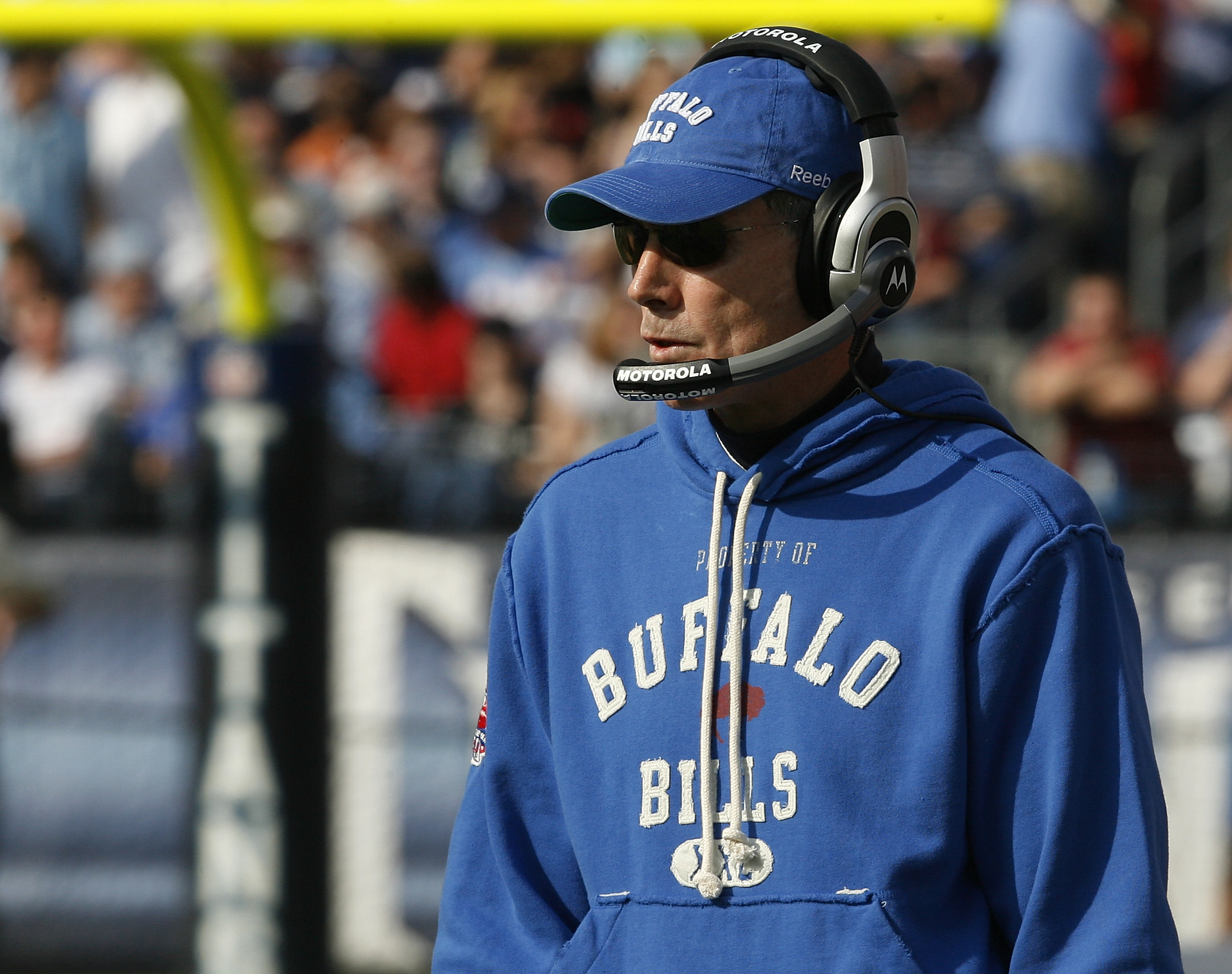 Buffalo Bills head coach Dick Jauron, center, watches a replay on