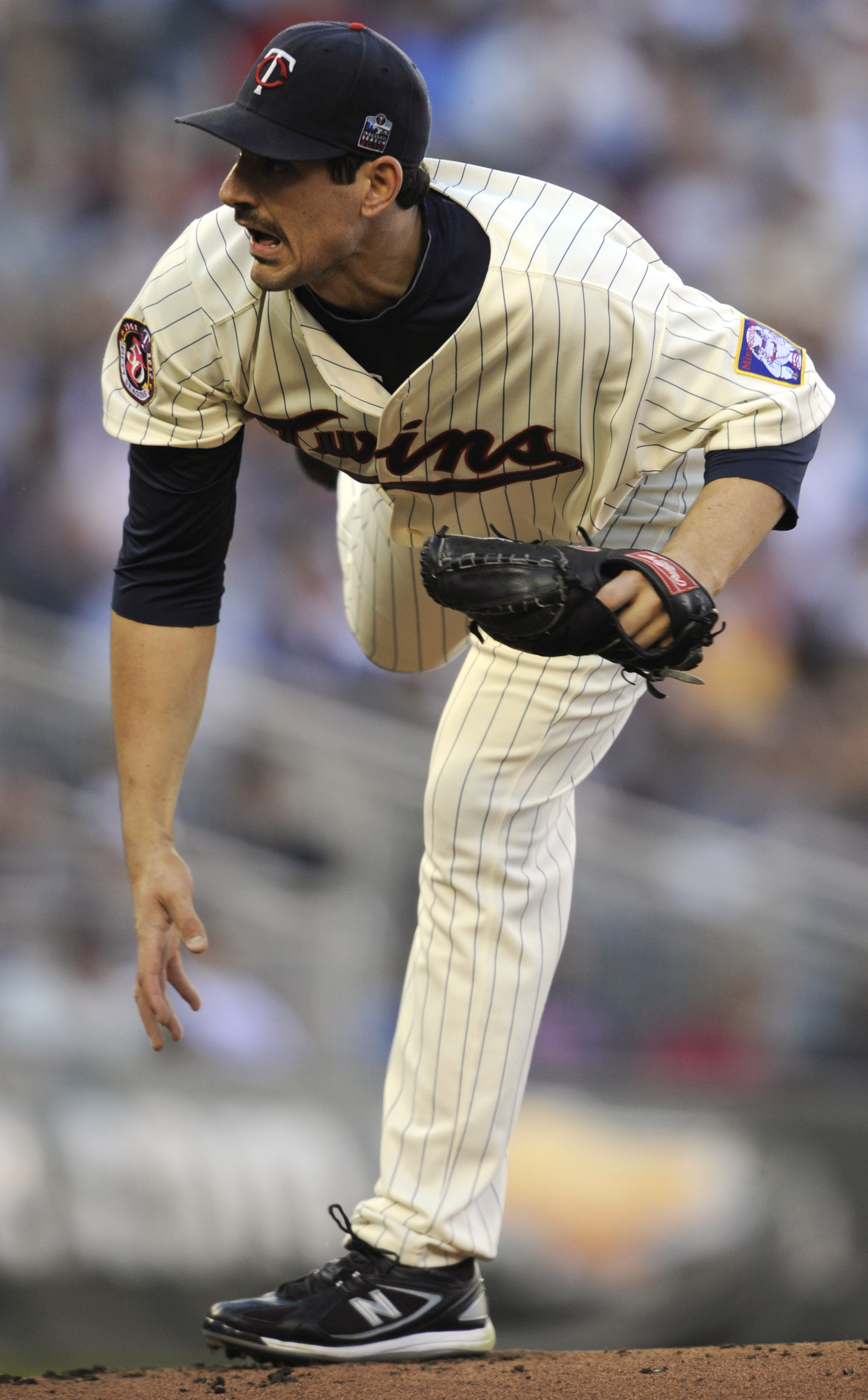 MINNEAPOLIS, MN - OCTOBER 7: Carl Pavano #48 of the Minnesota Twins pitches during game two of the ALDS game against the New York Yankees on October 7, 2010 at Target Field in Minneapolis, Minnesota.  (Photo by Hannah Foslien/Getty Images)