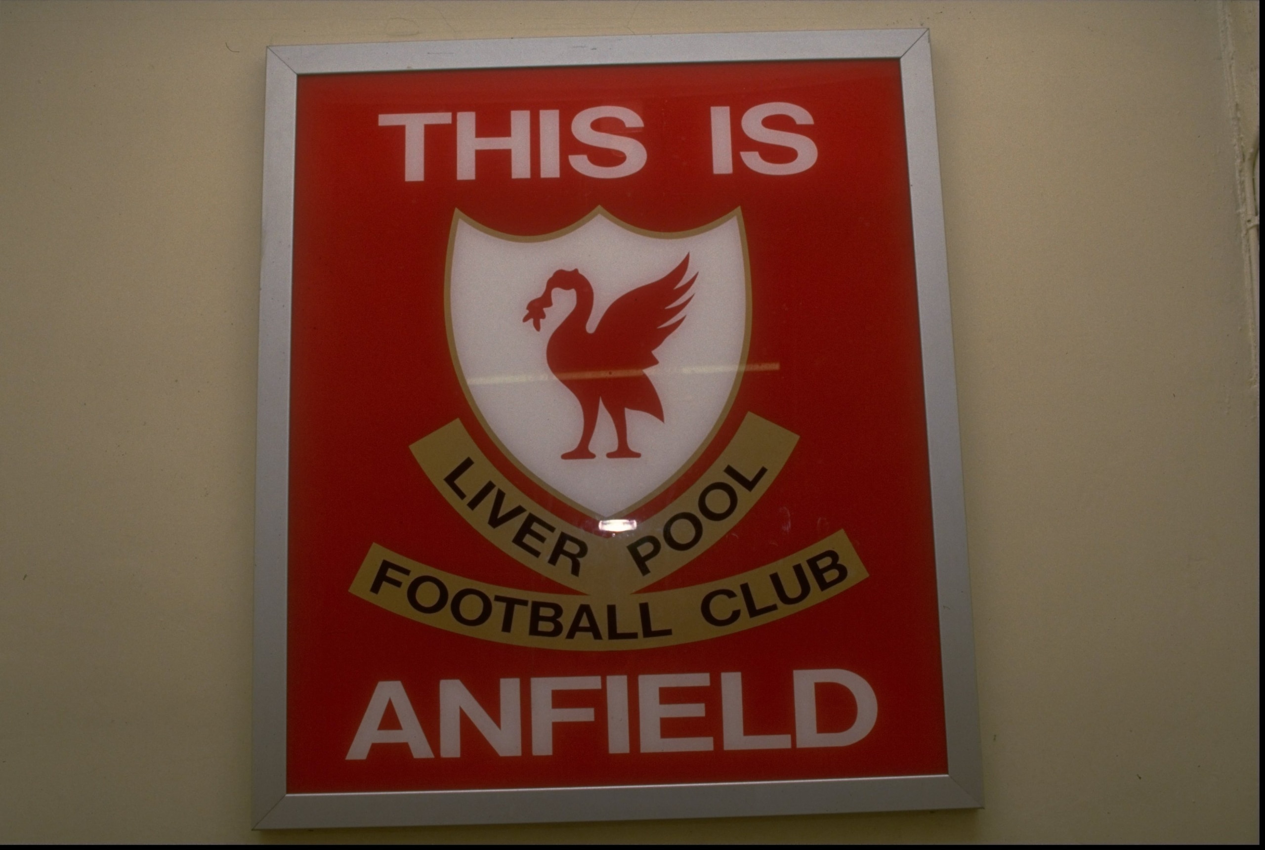 Sep 1989: The famous This is Anfield sign in the tunnel at Anfield pictured before the match against Tottenham Hotspur at Anfield in Liverpool, England. Liverpool won the match 1-0. The Liverpool players touch the emblem for good luck before going on tot Sep 1989: The famous This is Anfield sign in the tunnel at Anfield pictured before the match against Tottenham Hotspur at Anfield in Liverpool, England. Liverpool won the match 1-0. The Liverpool players touch the emblem for good luck before going on tot